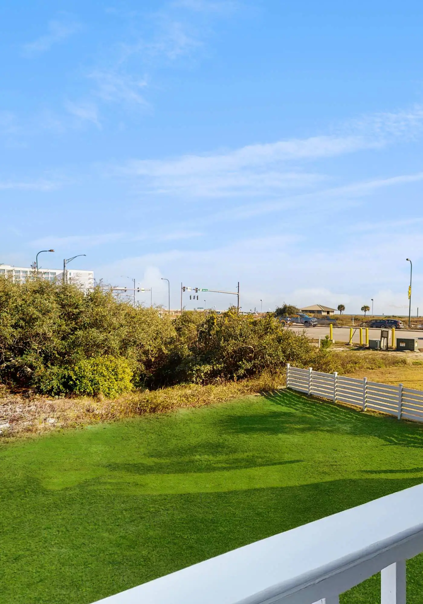 Beach resort condo with patio, central AC, WiFi, on-site pool, & beach access