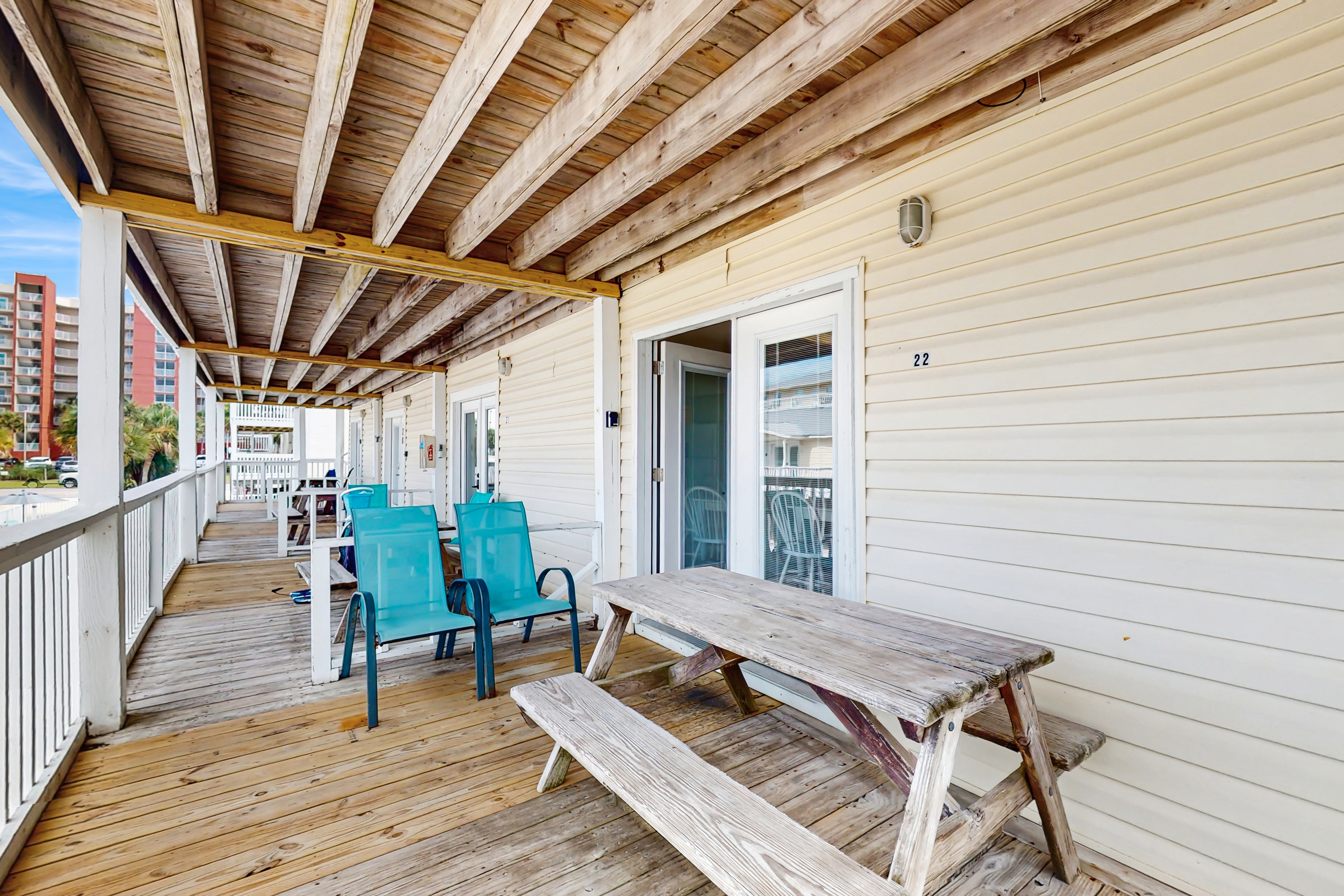 Bright condo near beach with pool access, balcony, & central AC