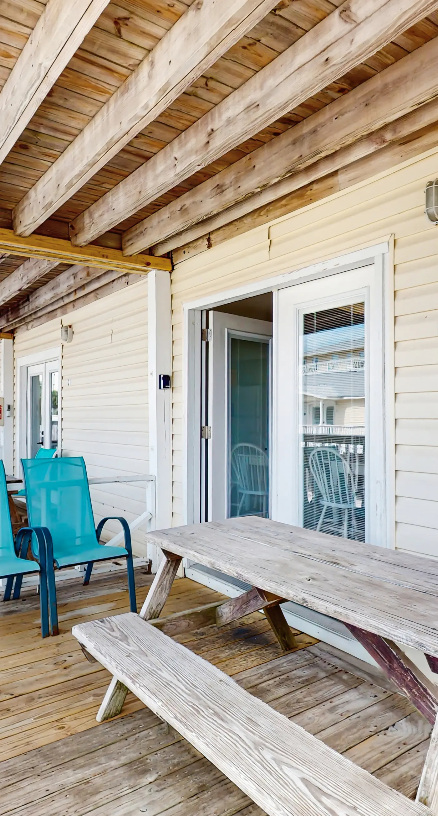 Bright condo near beach with pool access, balcony, & central AC