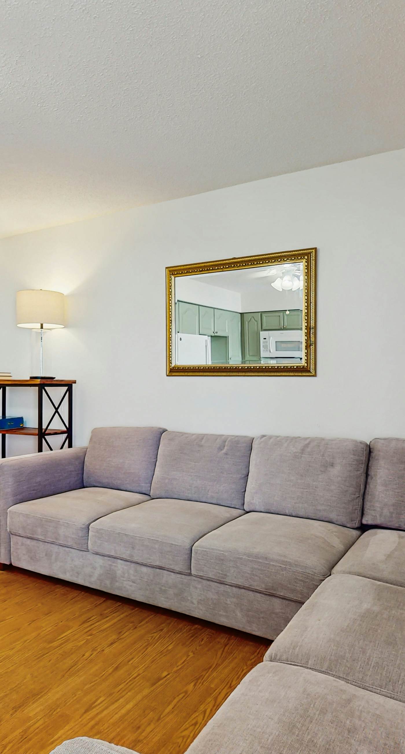 Bright condo near beach with pool access, balcony, & central AC