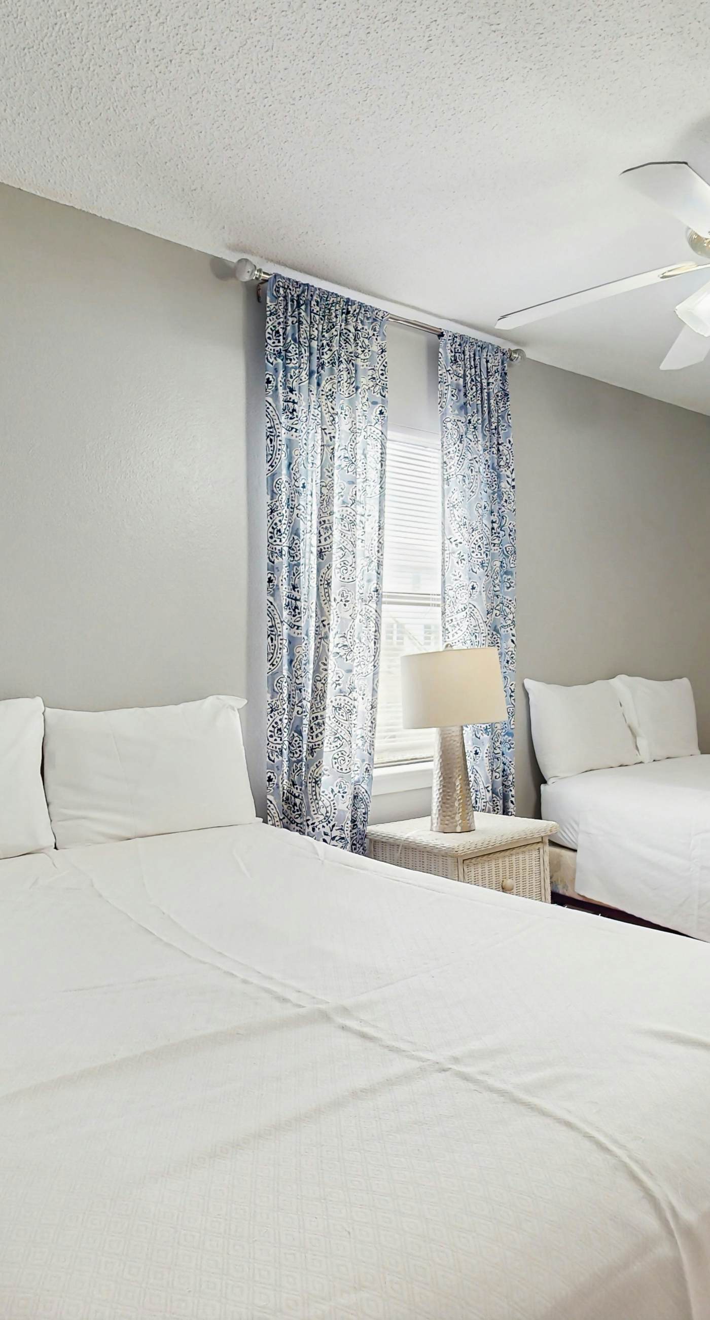 Bright condo near beach with pool access, balcony, & central AC