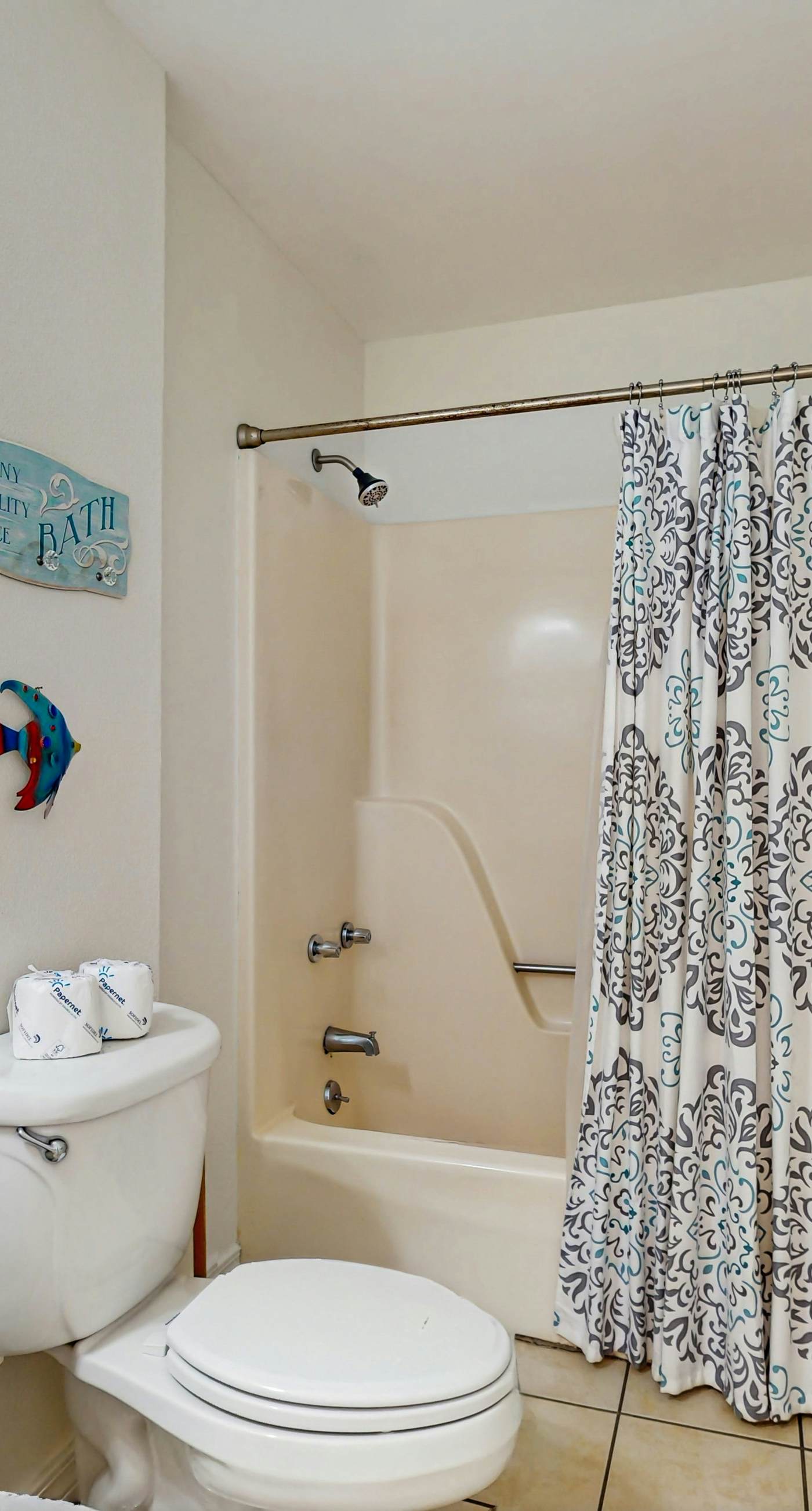 Bright condo near beach with pool access, balcony, & central AC