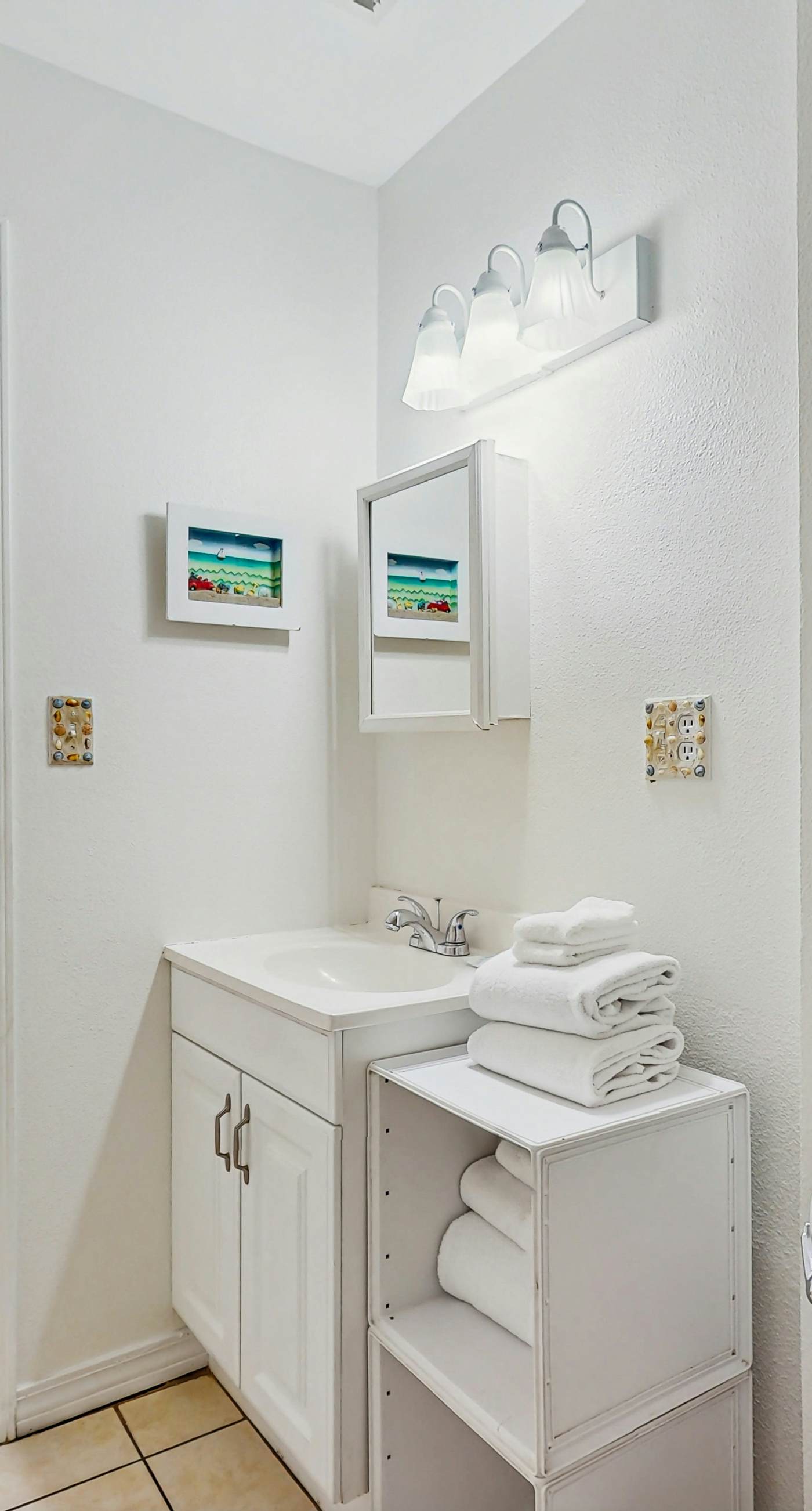 Bright condo near beach with pool access, balcony, & central AC