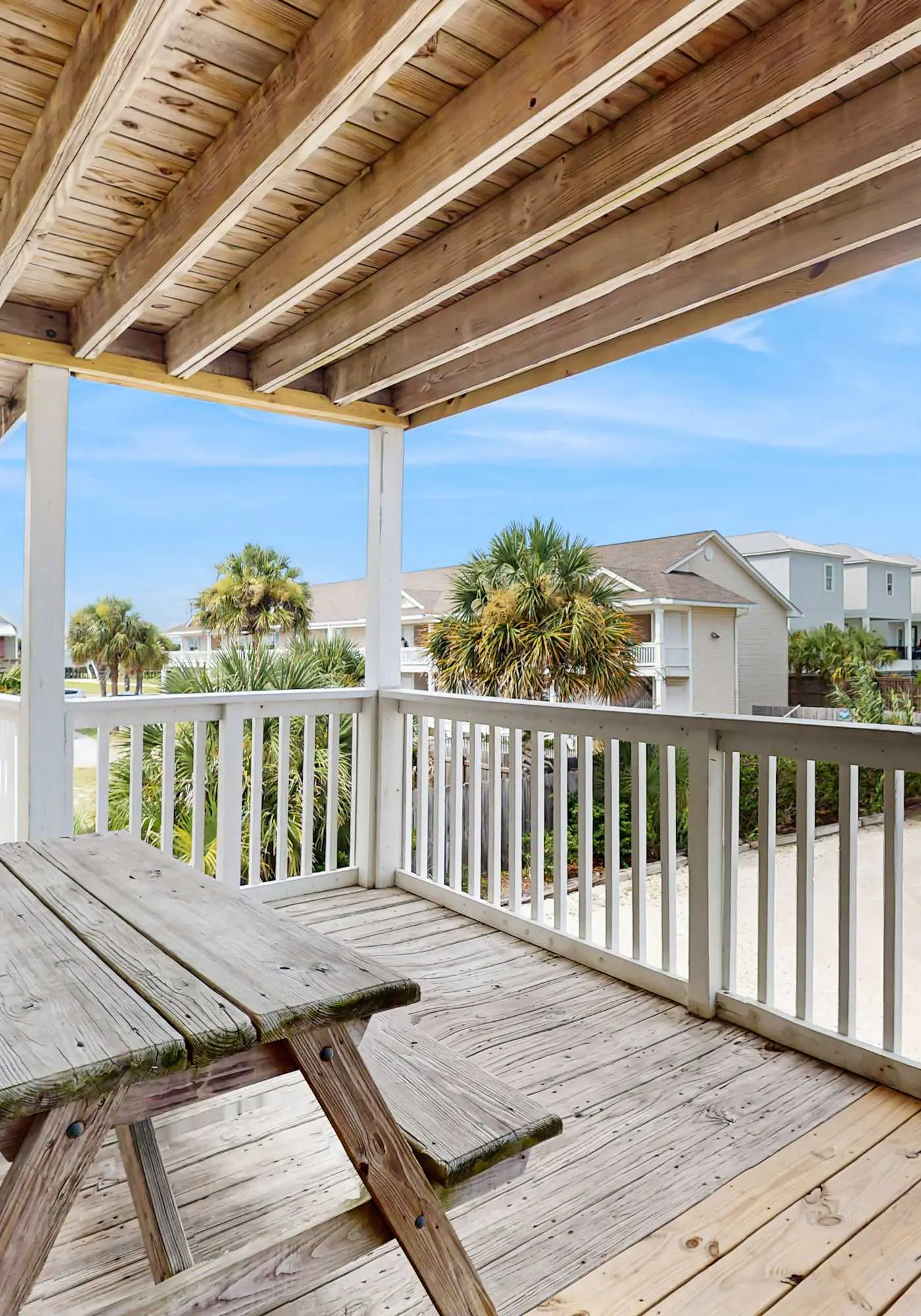 Bright condo near beach with pool access, balcony, & central AC
