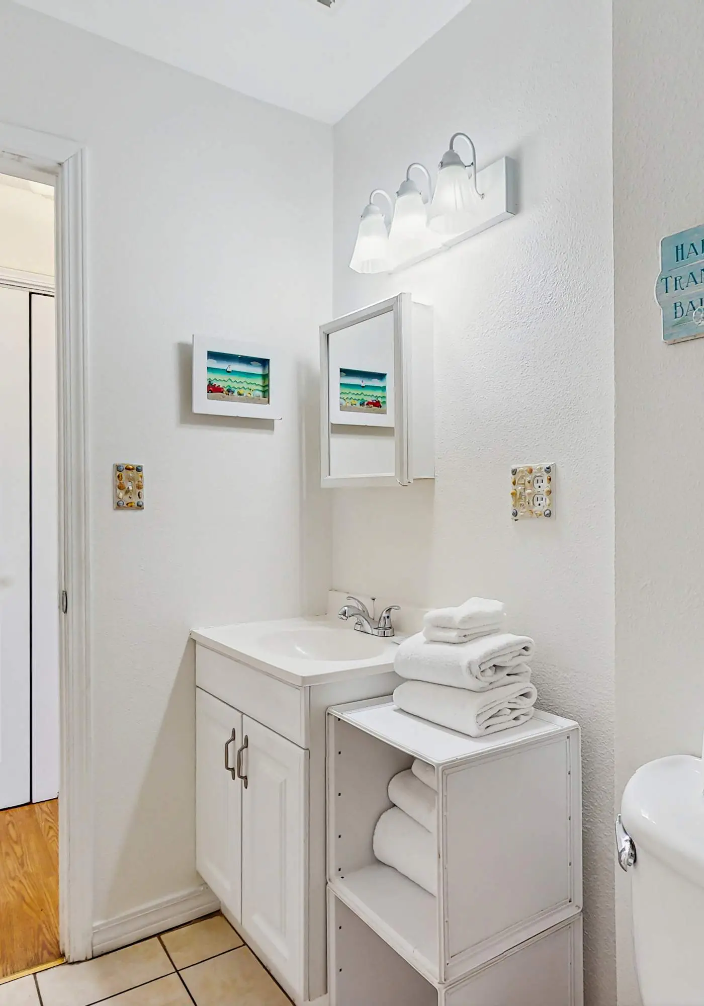 Bright condo near beach with pool access, balcony, & central AC