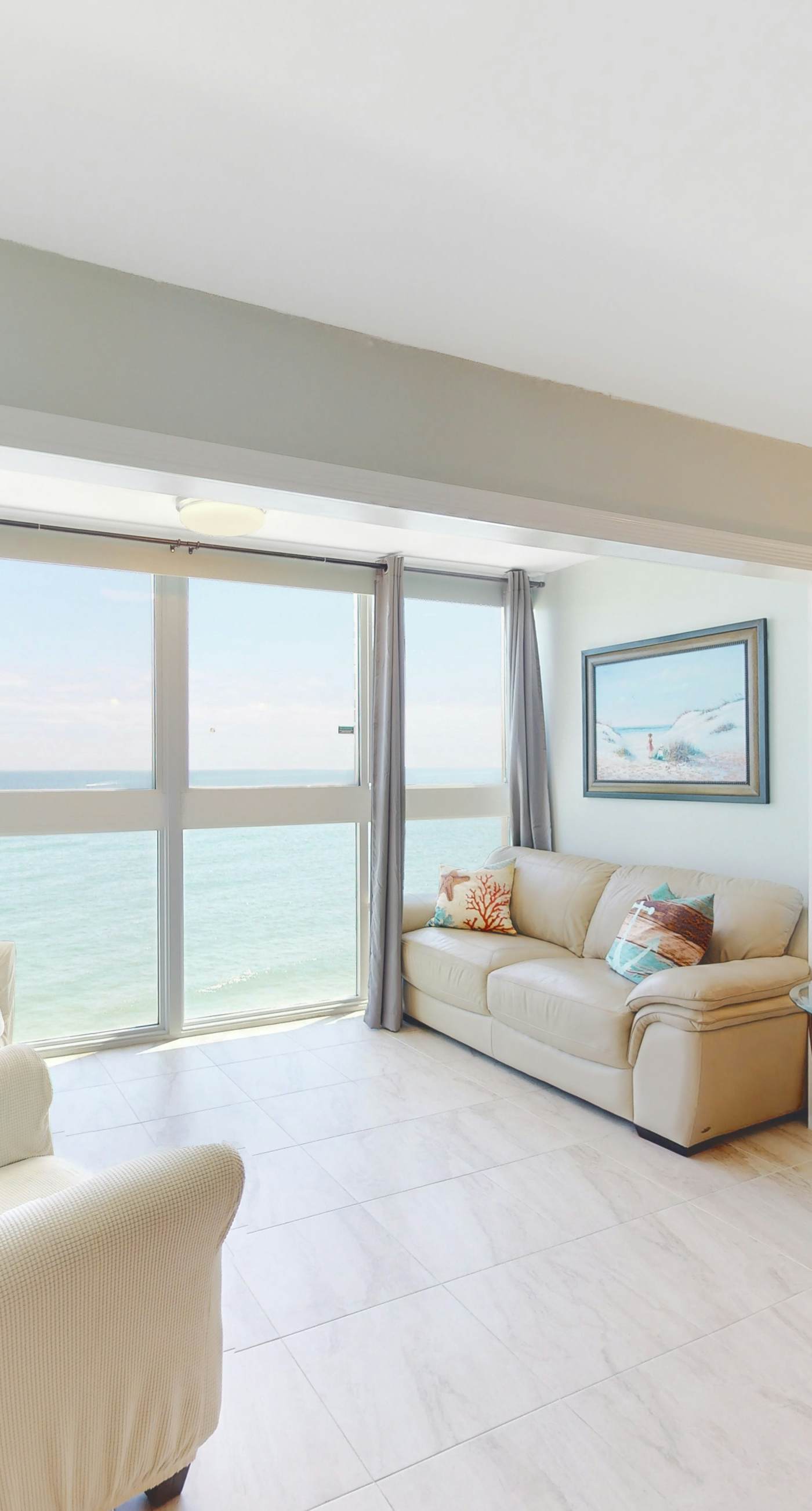 Beachfront condo with Gulf views, pool, washer,dryer, & central AC