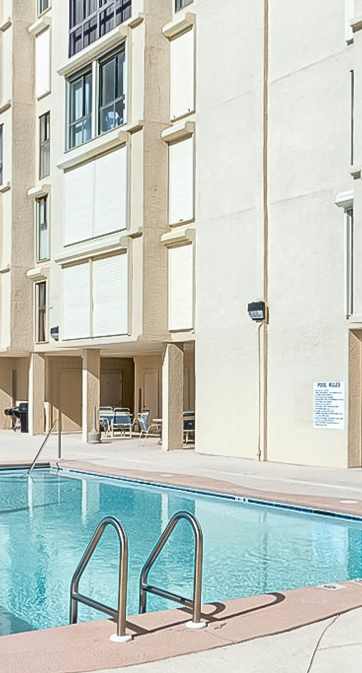 Beachfront condo with Gulf views, pool, washer,dryer, & central AC