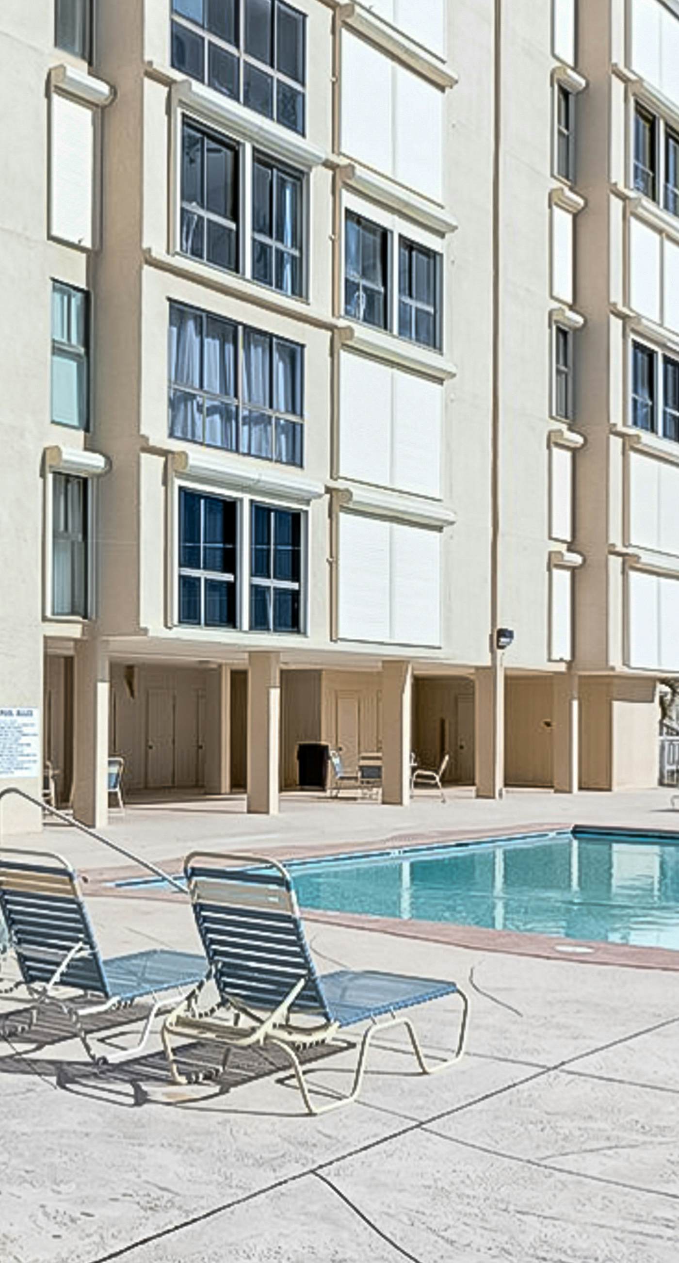 Beachfront condo with Gulf views, pool, washer,dryer, & central AC