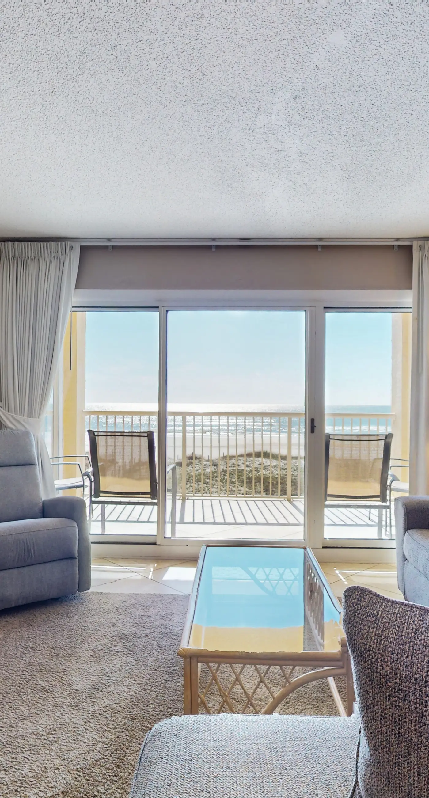 2nd-floor beachfront condo with Gulf views, balcony, outdoor pool, W/D, elevator