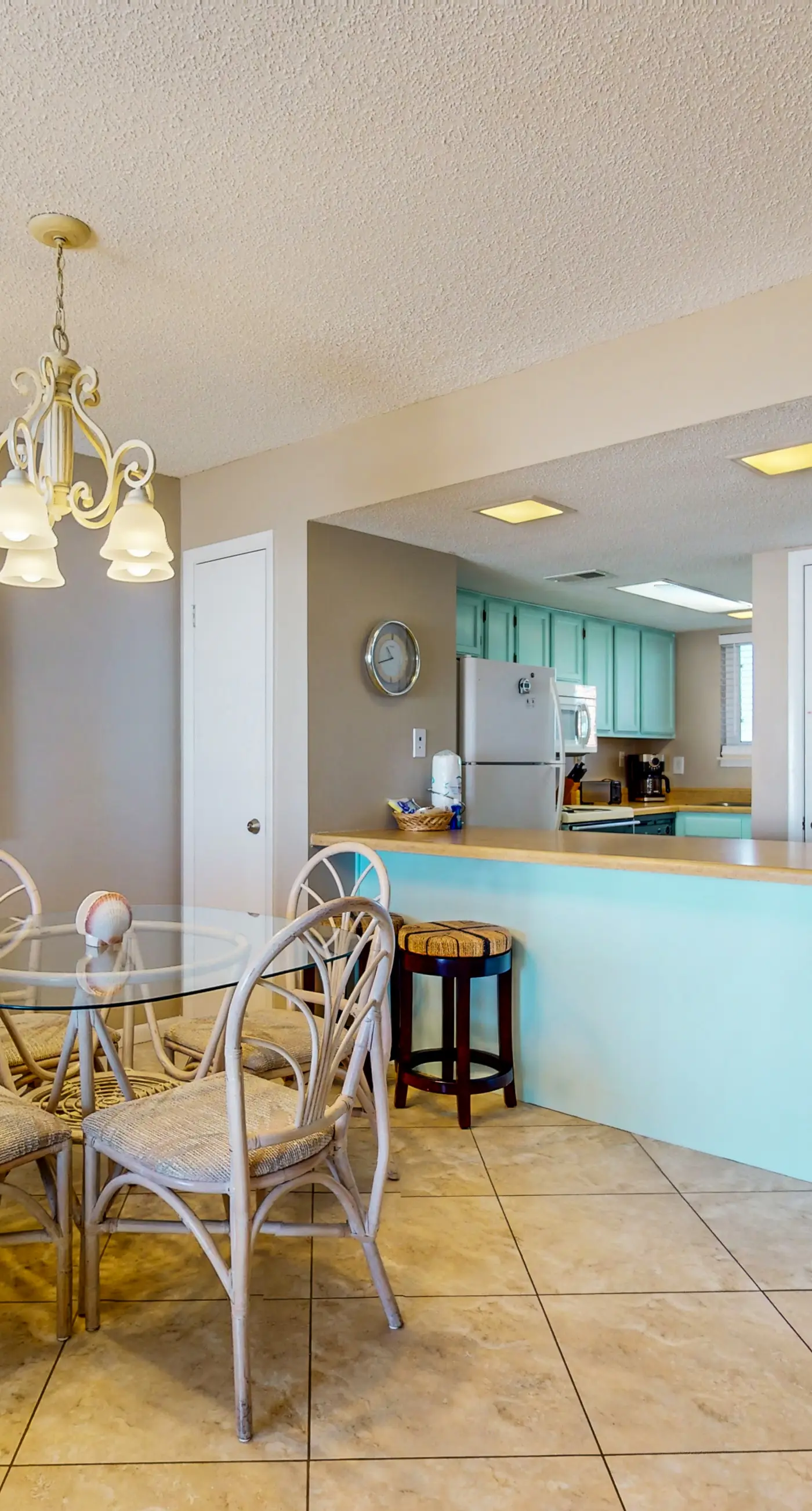 2nd-floor beachfront condo with Gulf views, balcony, outdoor pool, W/D, elevator