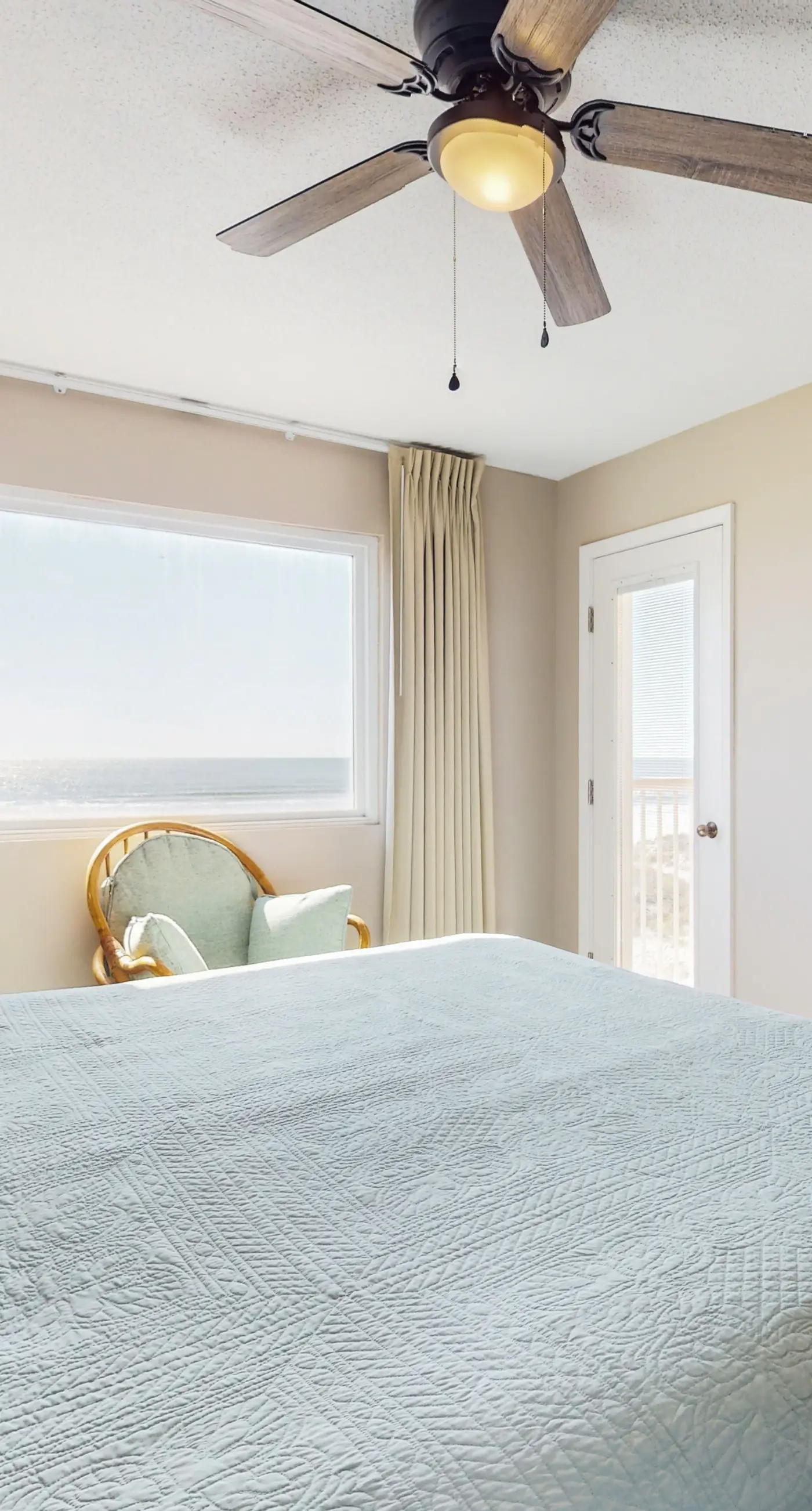 2nd-floor beachfront condo with Gulf views, balcony, outdoor pool, W/D, elevator