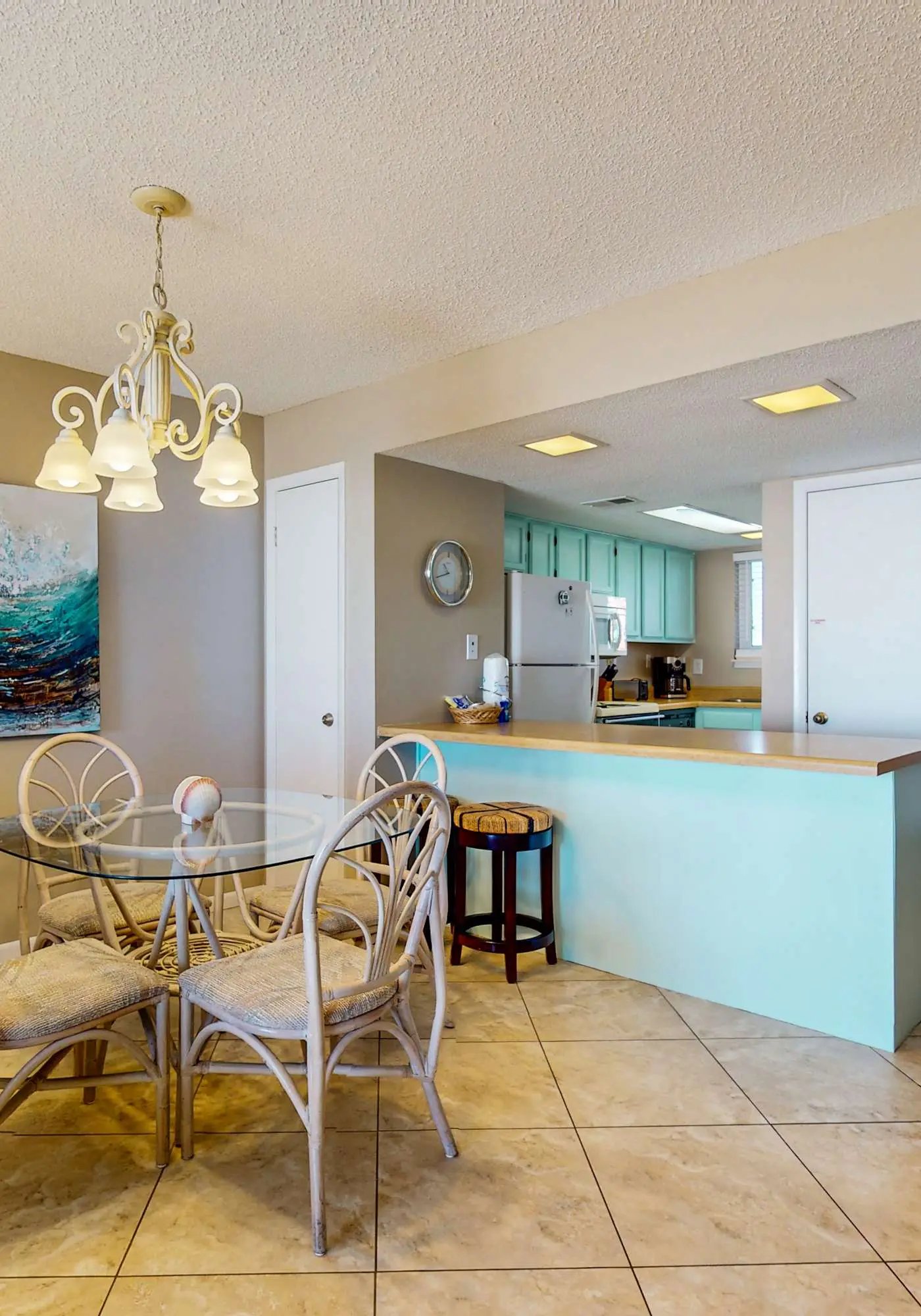 2nd-floor beachfront condo with Gulf views, balcony, outdoor pool, W/D, elevator