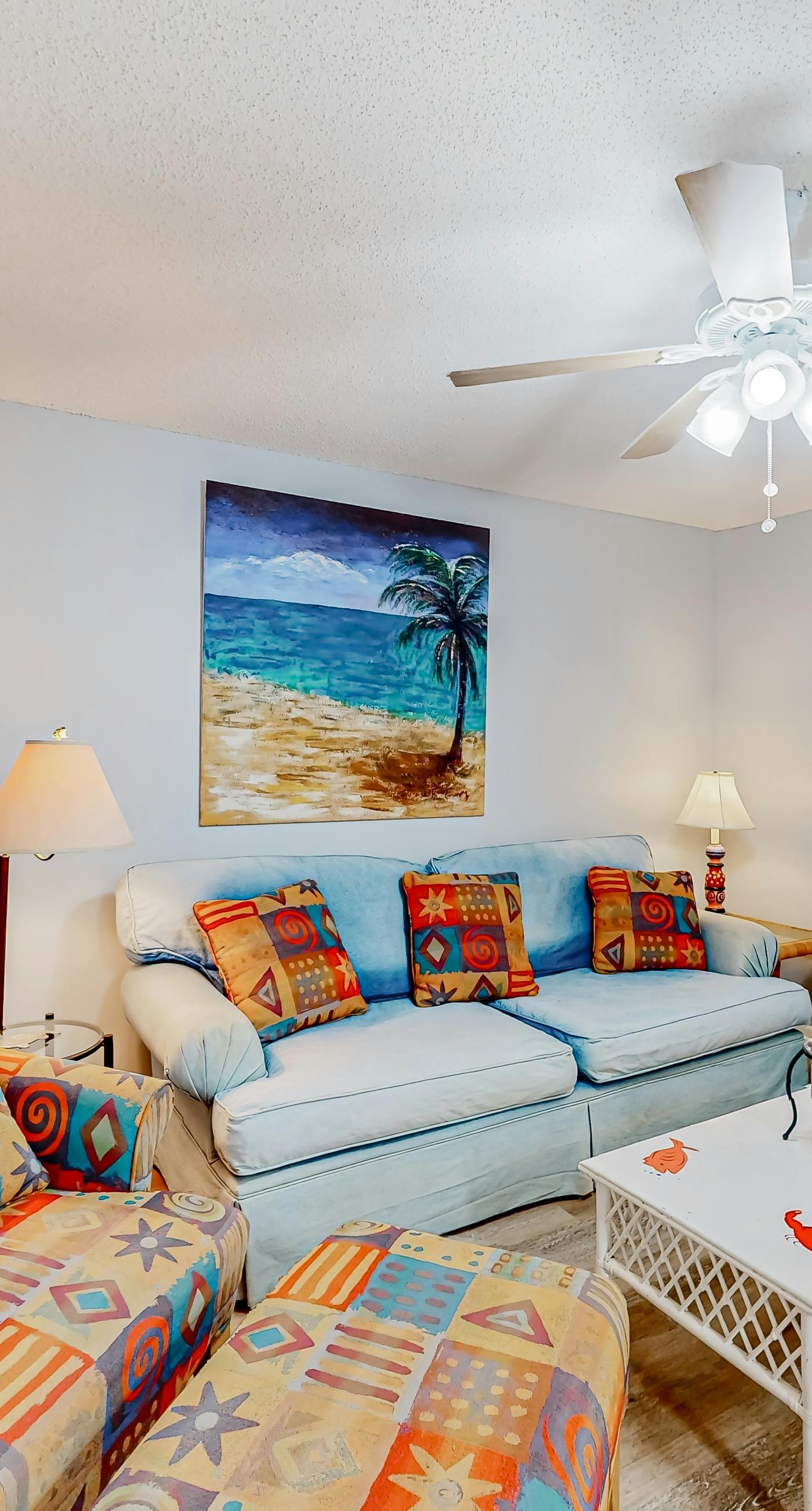 Perfectly located waterfront condo with AC & W/D - steps away from sandy beaches