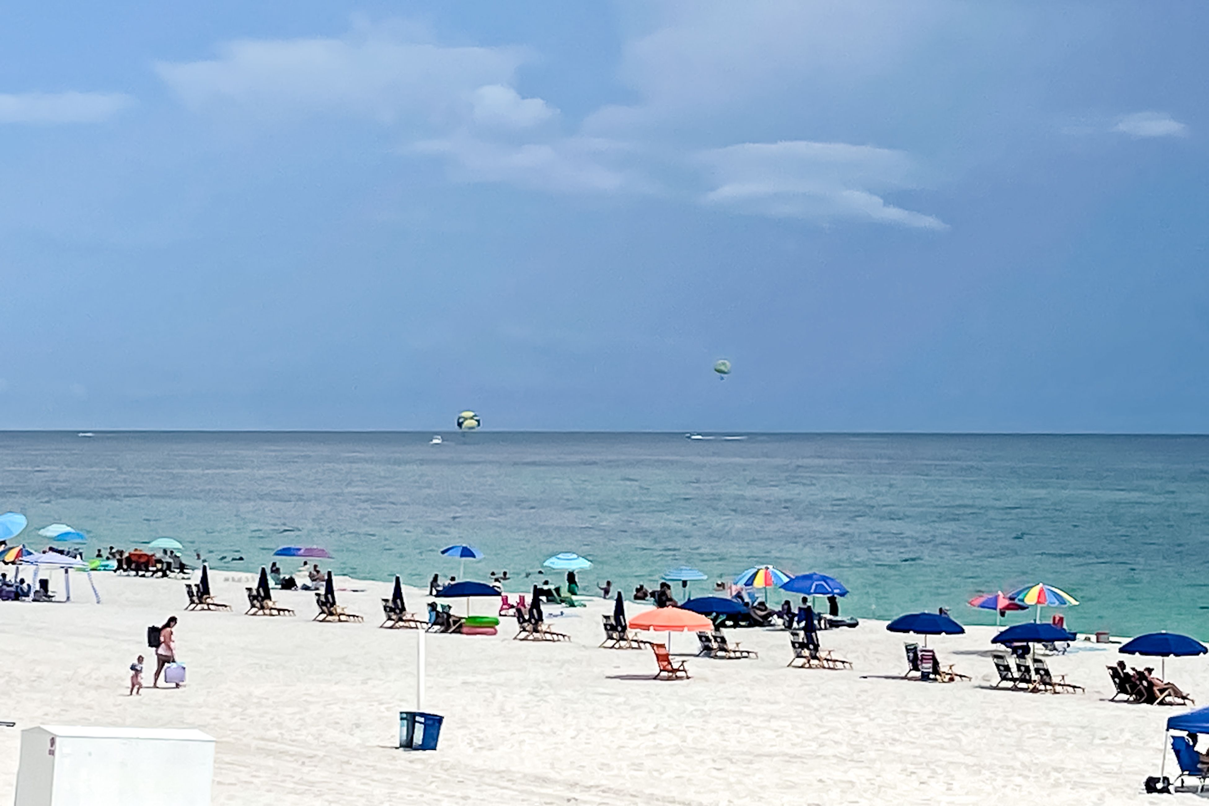 Perfectly located waterfront condo with AC & W/D - steps away from sandy beaches