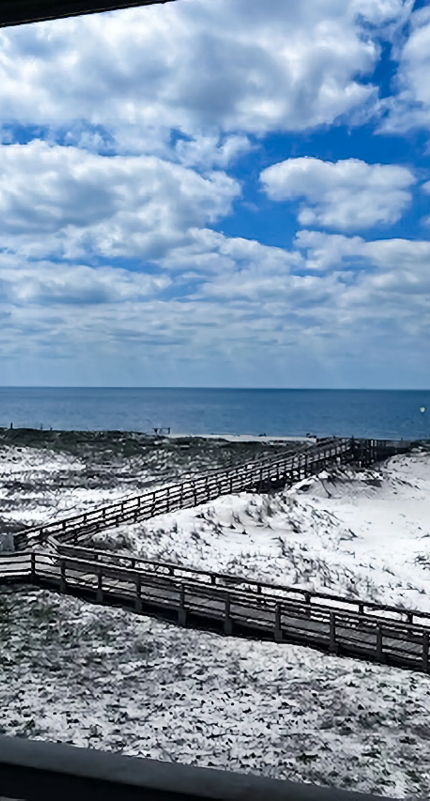 Bright oceanfront condo with pool, hot tub, sauna, tennis & central AC