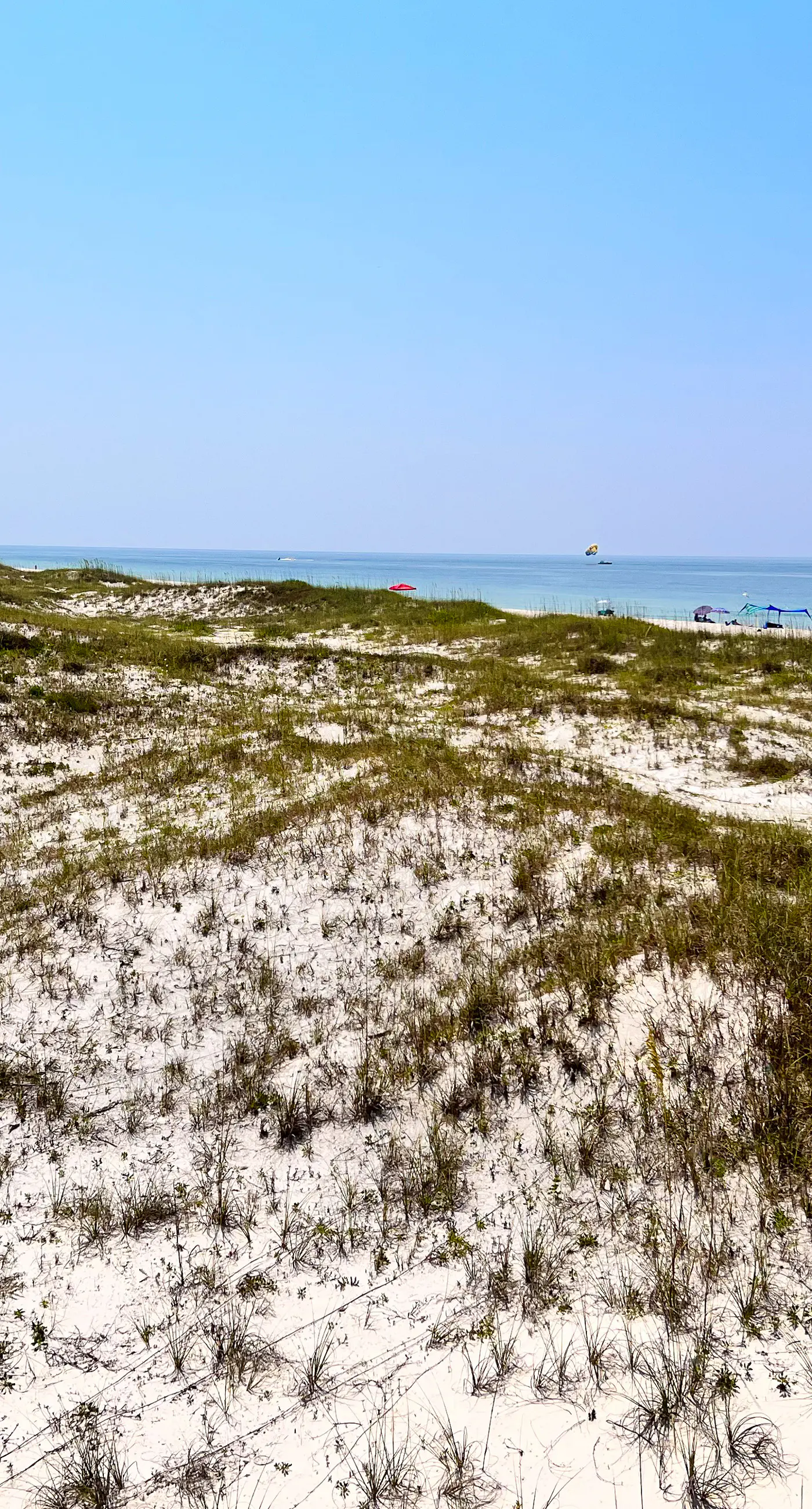 Bright oceanfront condo with pool, hot tub, sauna, tennis & central AC