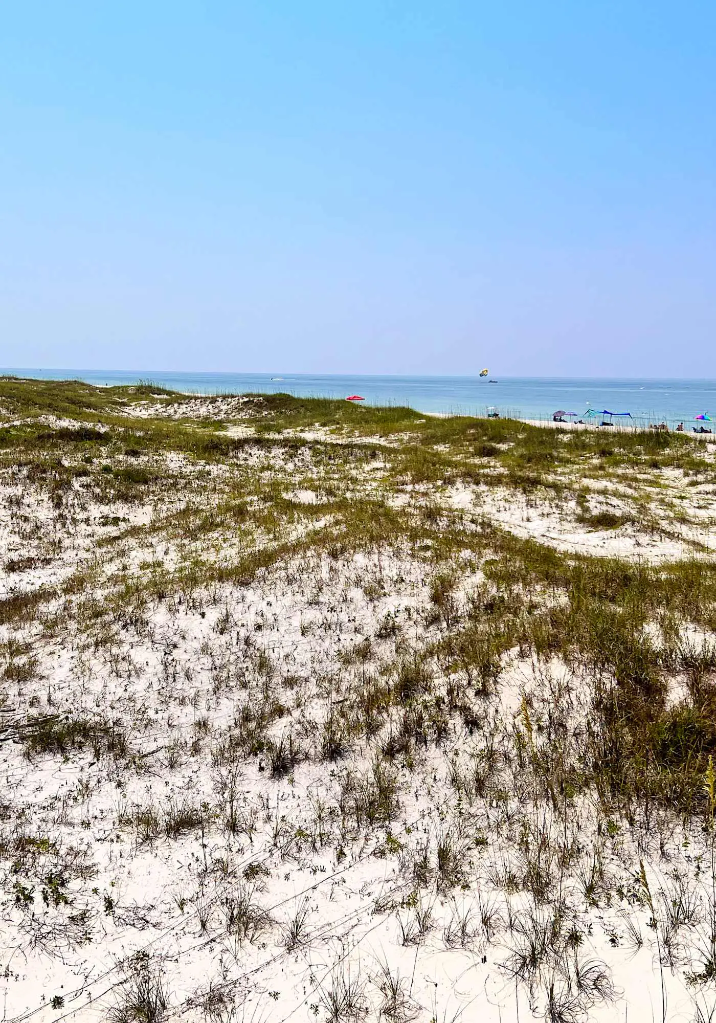 Bright oceanfront condo with pool, hot tub, sauna, tennis & central AC