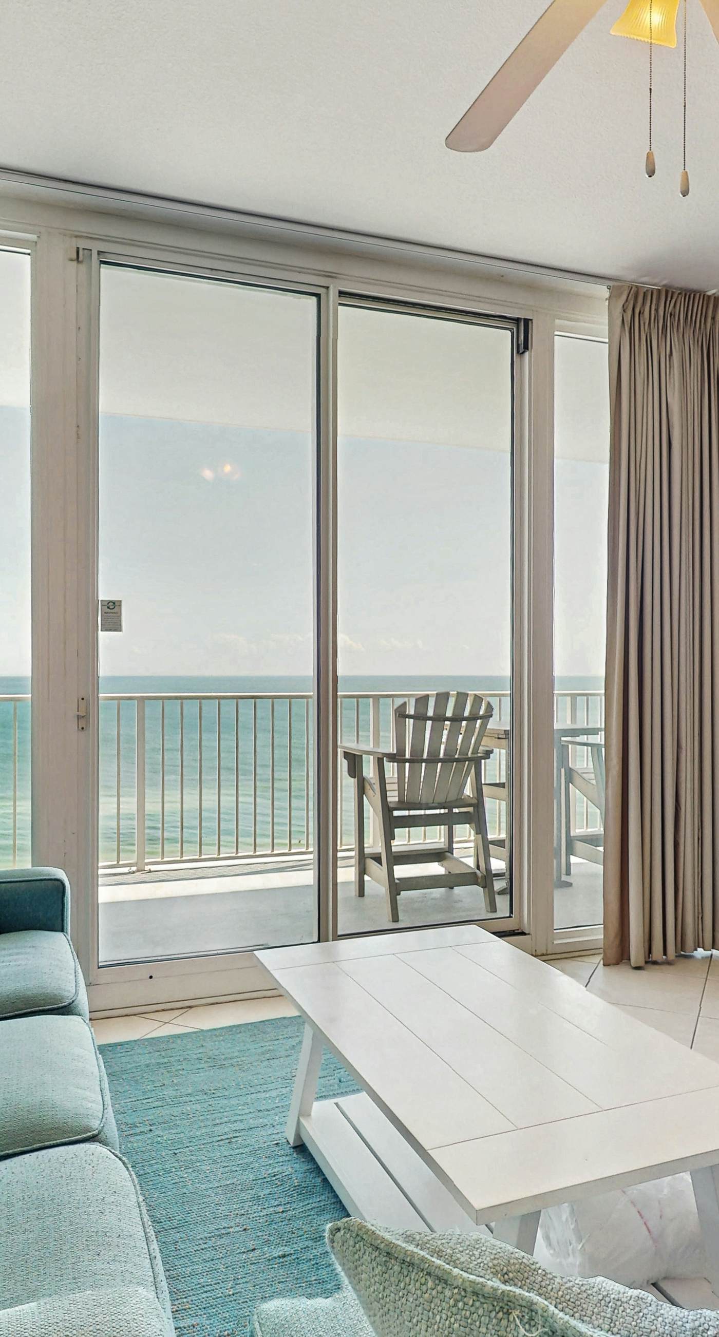 Bright beachfront condo w/ private balcony, zero-entry pool, gym, & hot tub