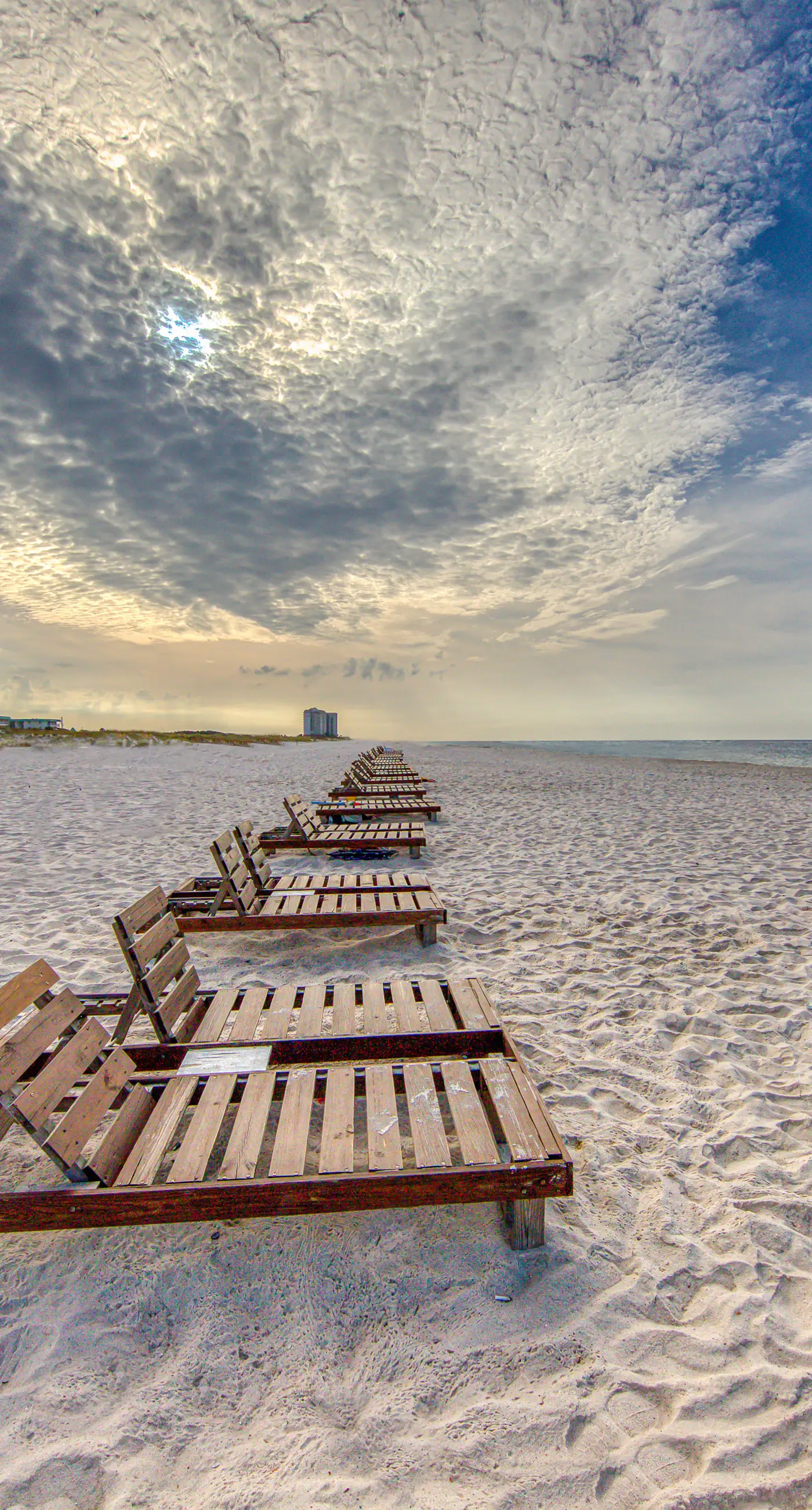 Gulf-front condo with beach access, pools, hot tub, & sports courts