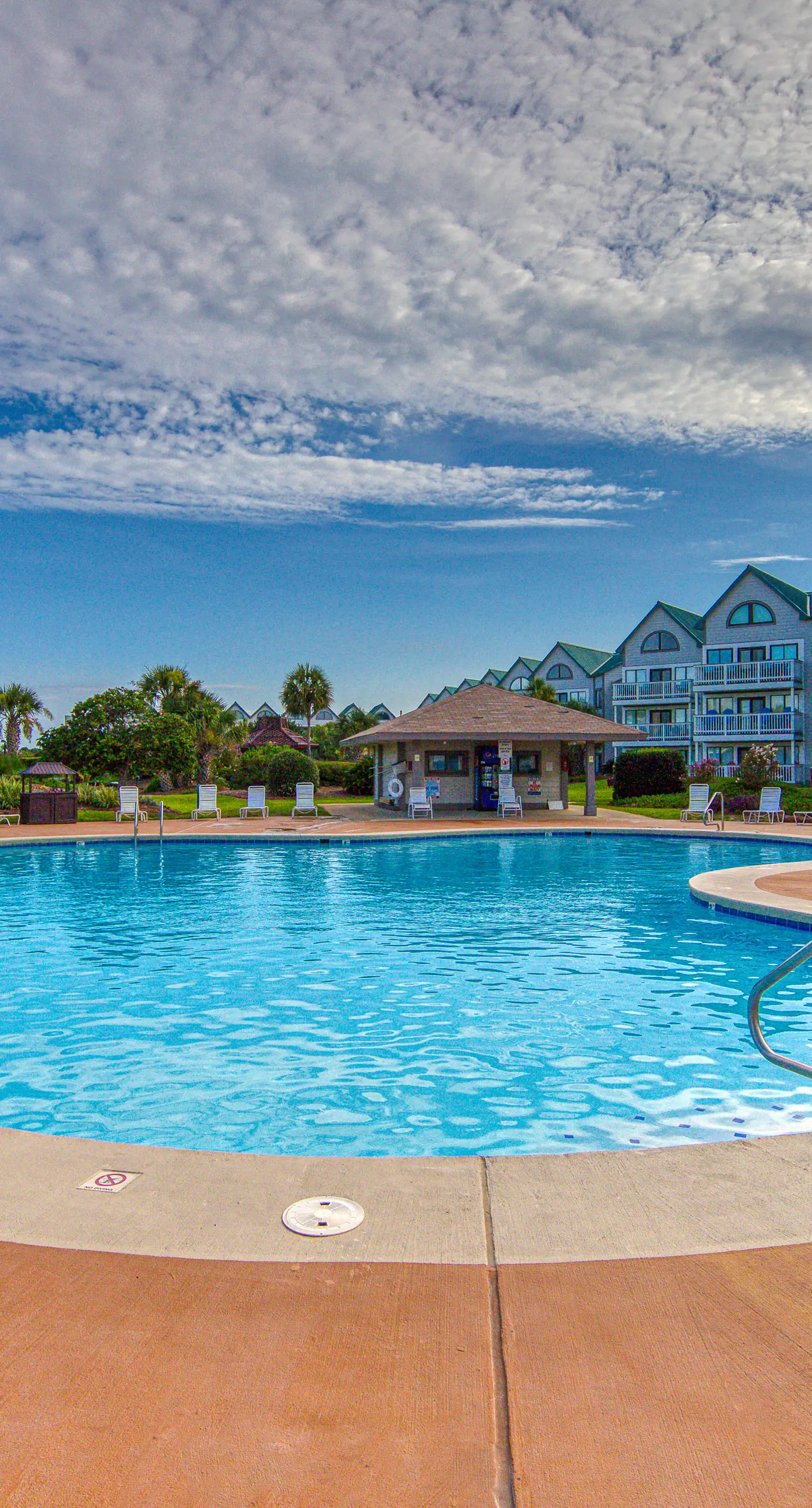 Gulf-front condo with beach access, pools, hot tub, & sports courts