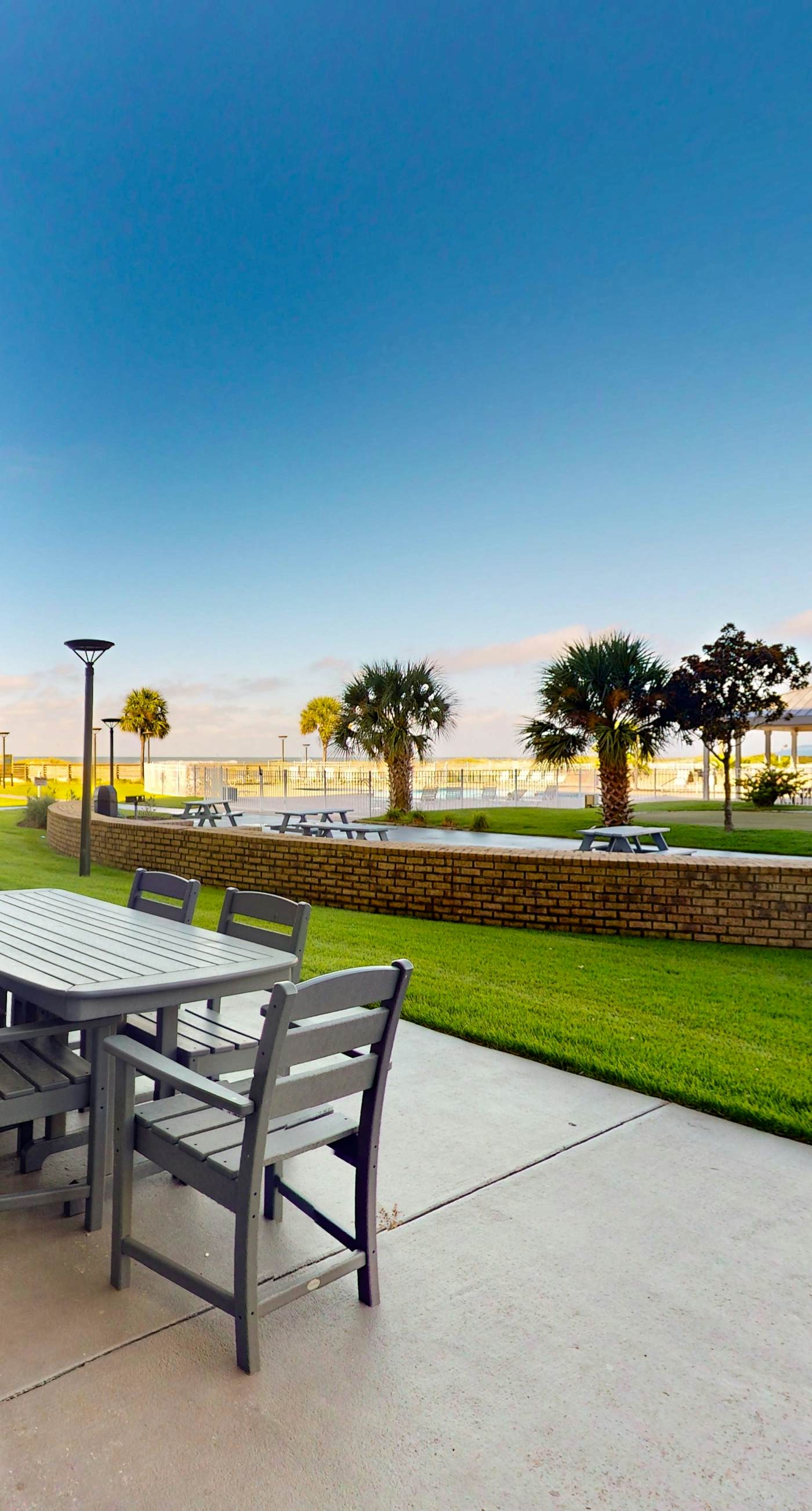 Gulf-front ground floor condo with beach access, pools, hot tub, & sports courts