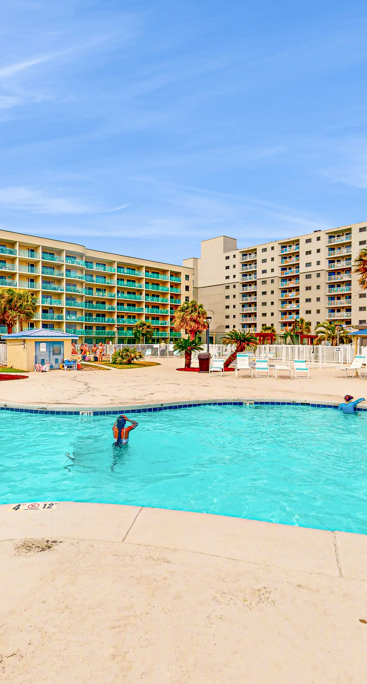 Gulf-front condo with beach access, pools, hot tub, & sports courts