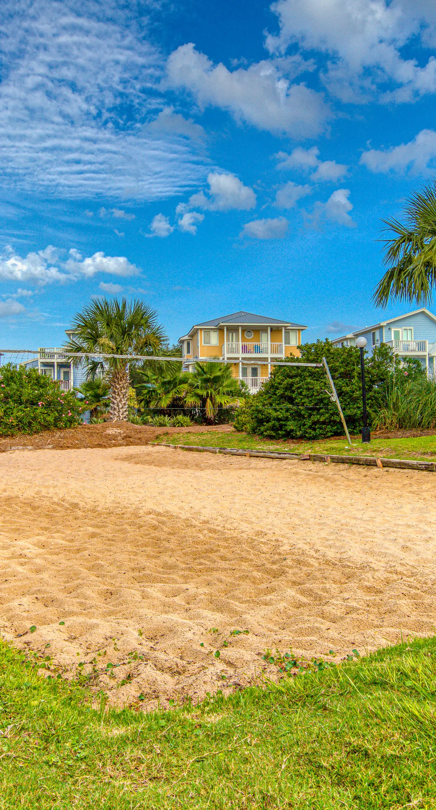 Gulf-front condo with beach access, pools, hot tub, & sports courts