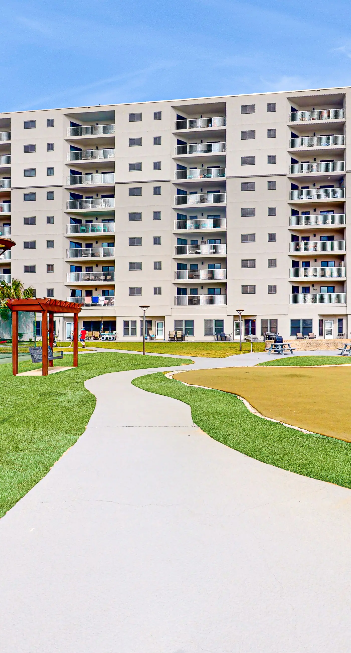 Gulf-front condo with beach access, pools, hot tub, & sports courts