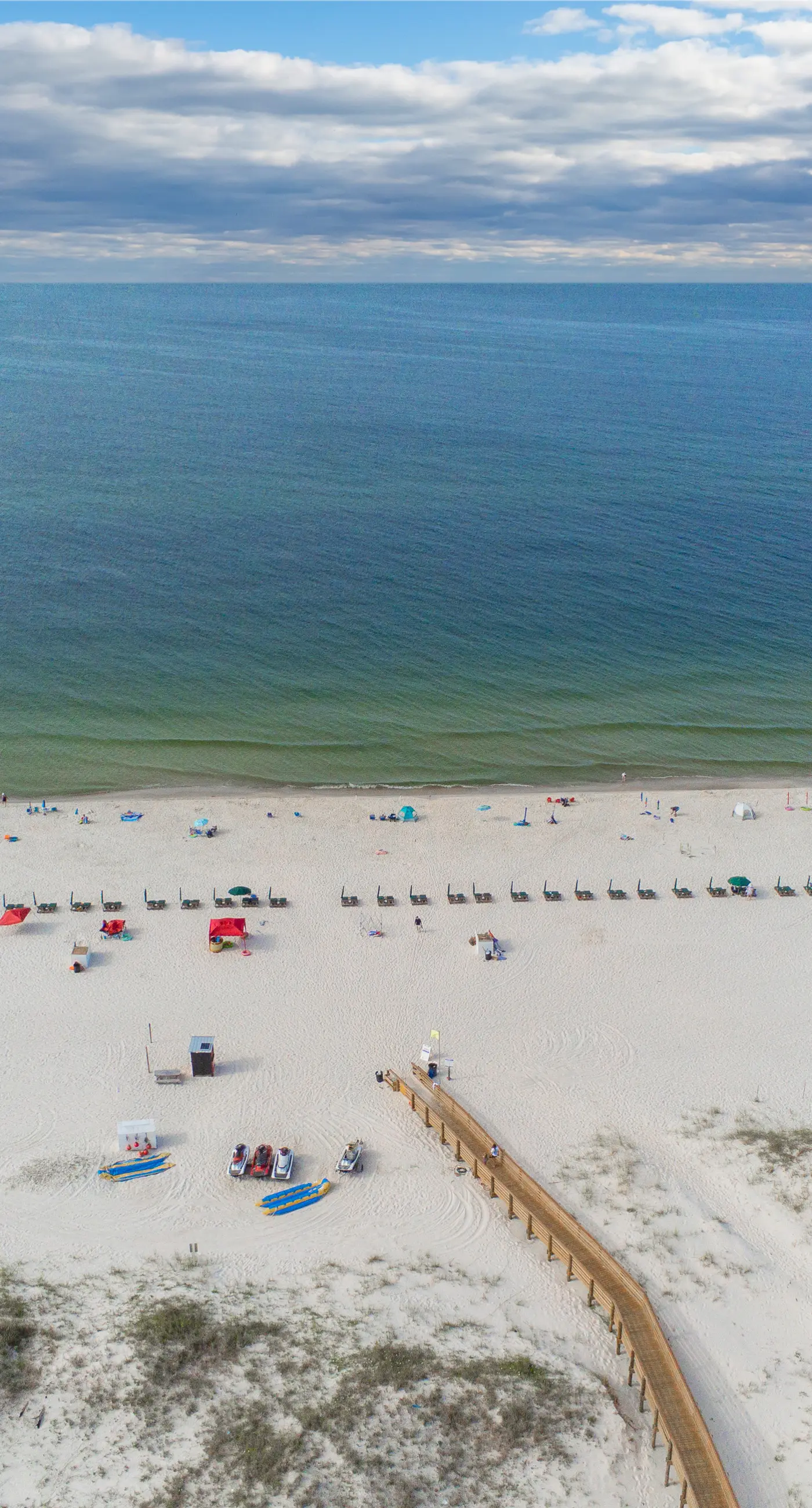 Gulf-front condo with beach access, pools, hot tub, & sports courts