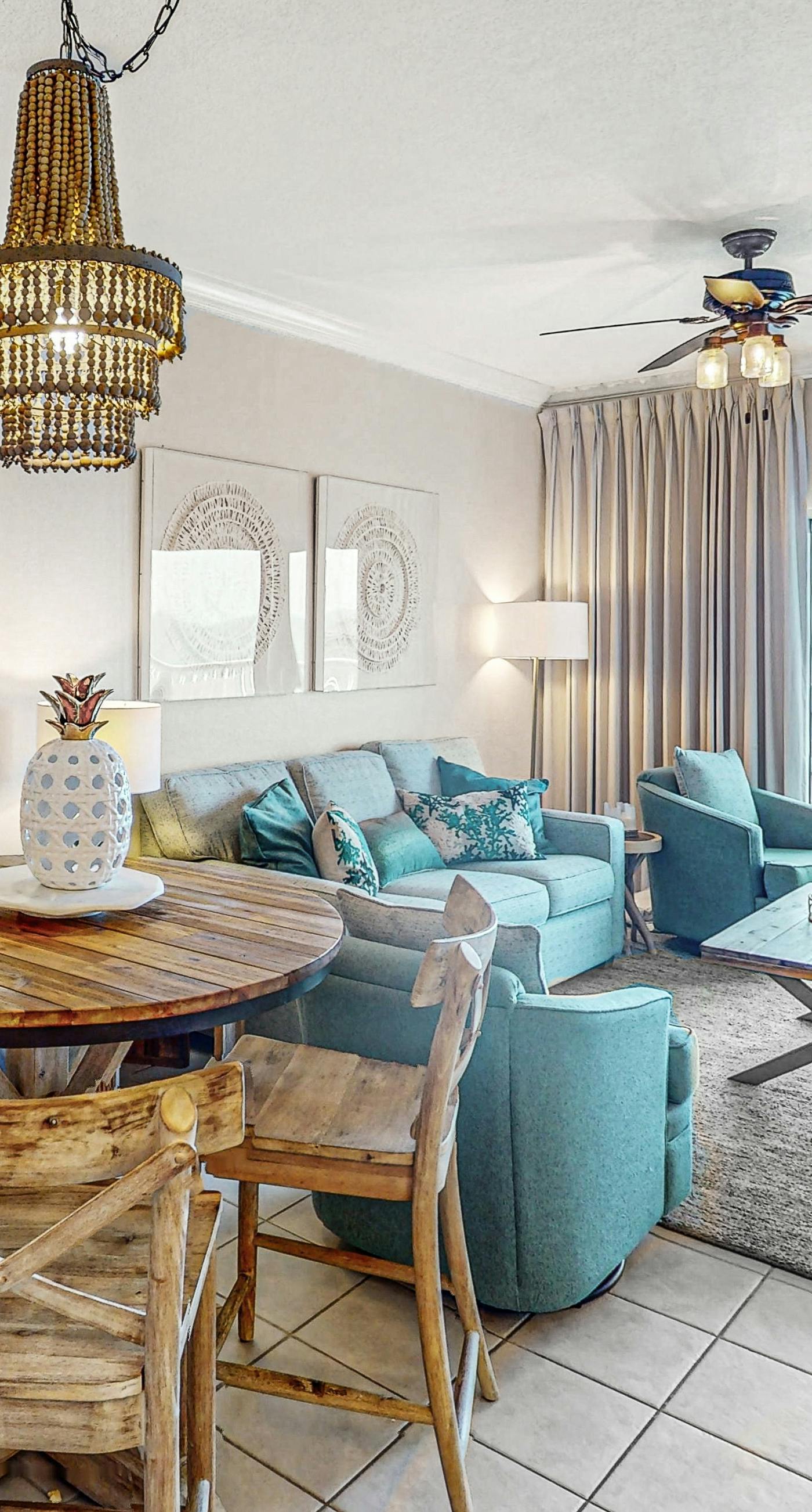 Gulf view condo with resort amenities, scenic balcony, open layout, W&D, & AC