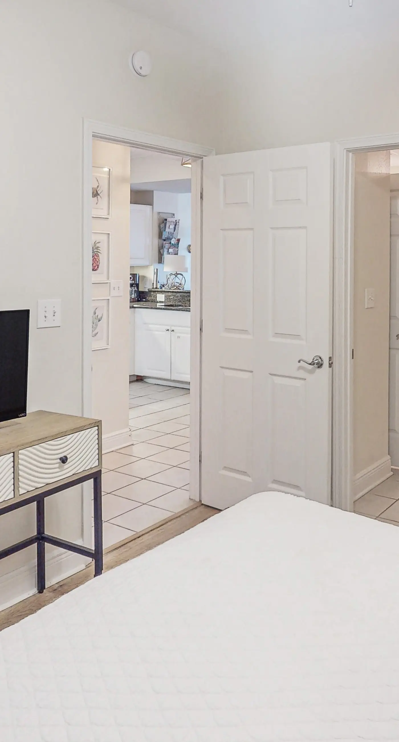 Gulf view condo with resort amenities, scenic balcony, open layout, W&D, & AC