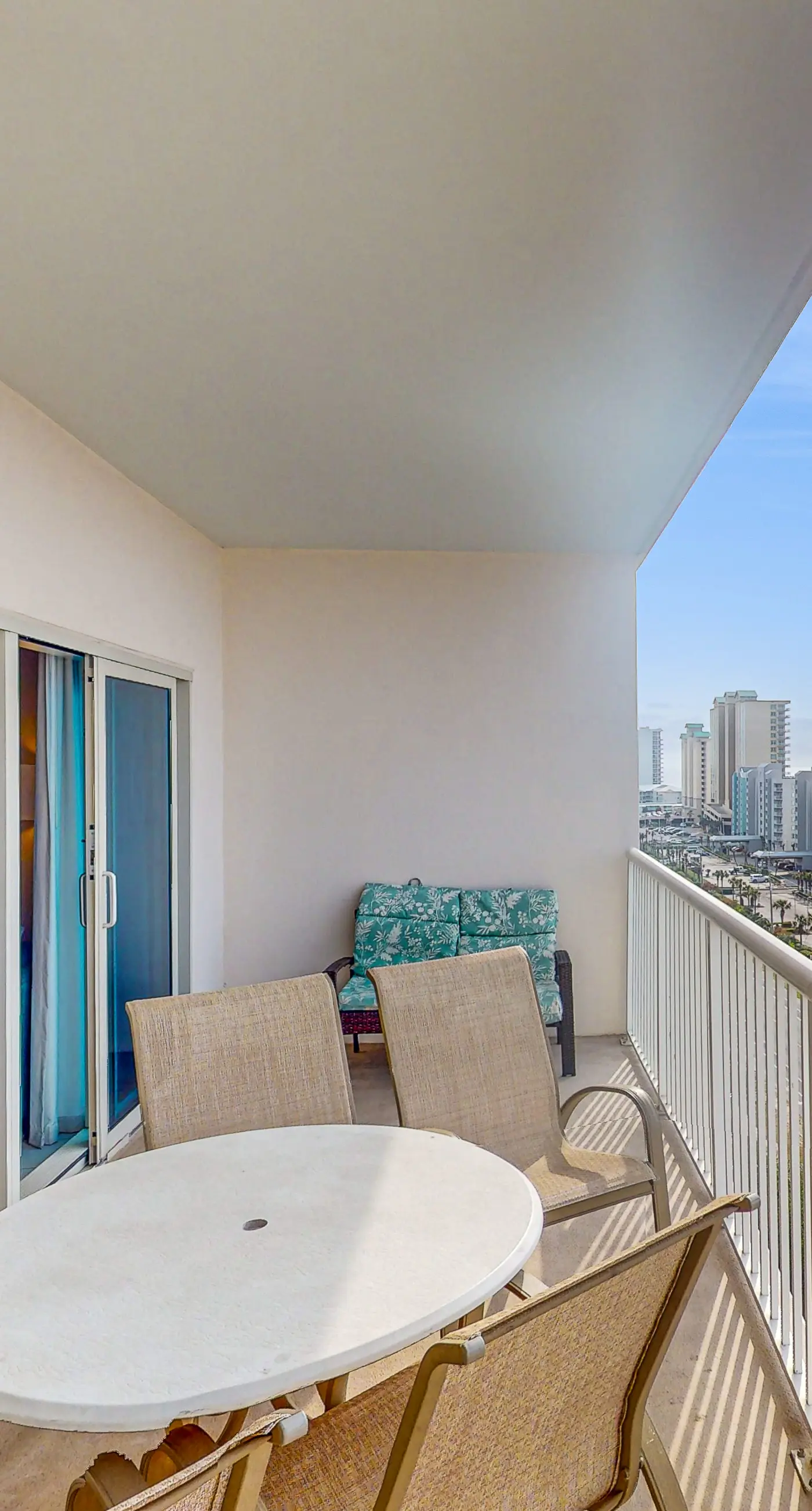 Gulf view condo with resort amenities, scenic balcony, open layout, W&D, & AC
