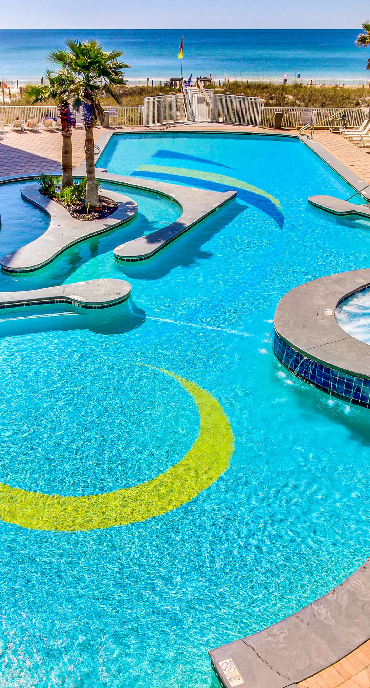 Gulf view condo with resort amenities, scenic balcony, open layout, W&D, & AC