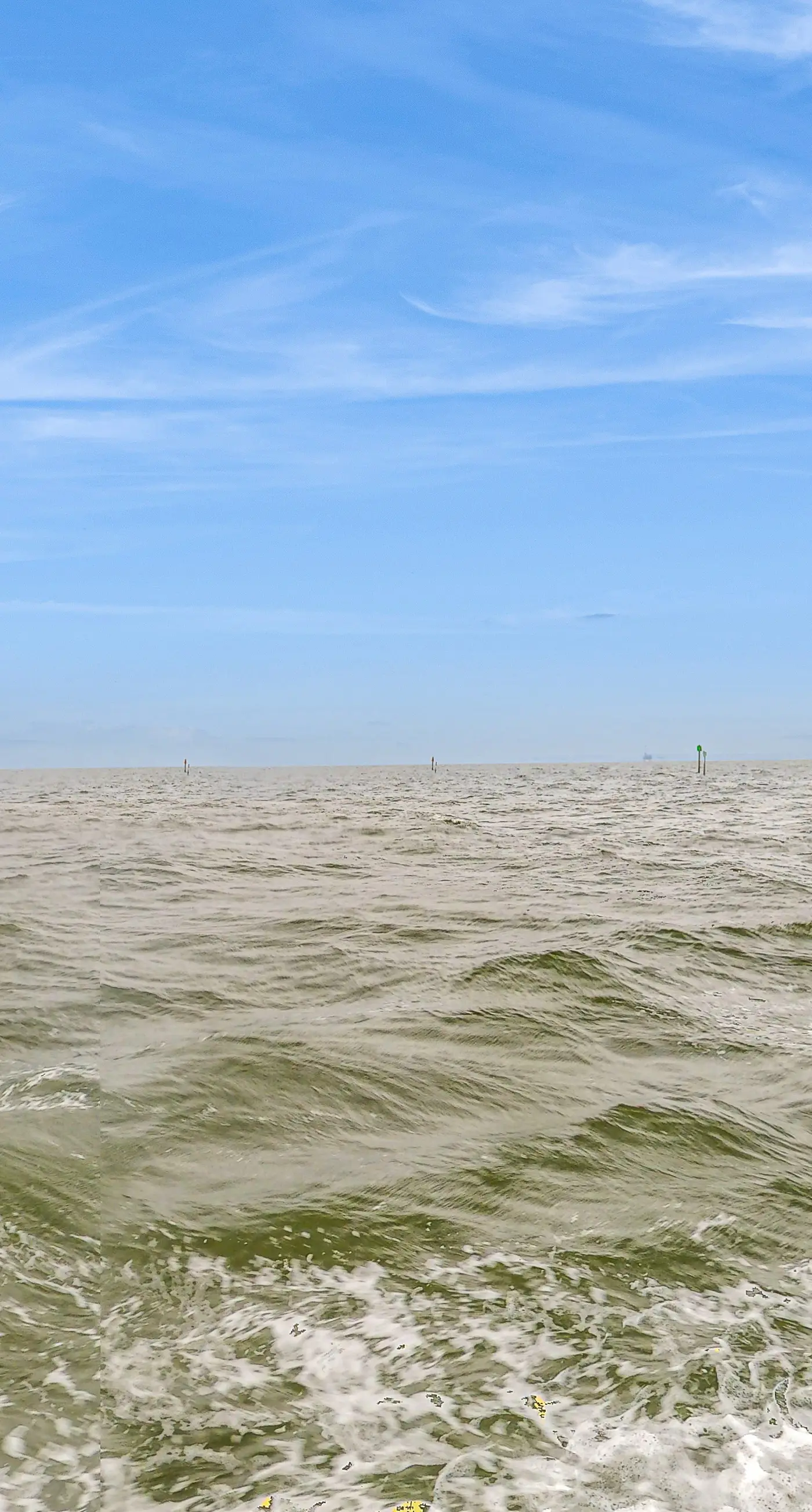 Gulf view condo with resort amenities, scenic balcony, open layout, W&D, & AC