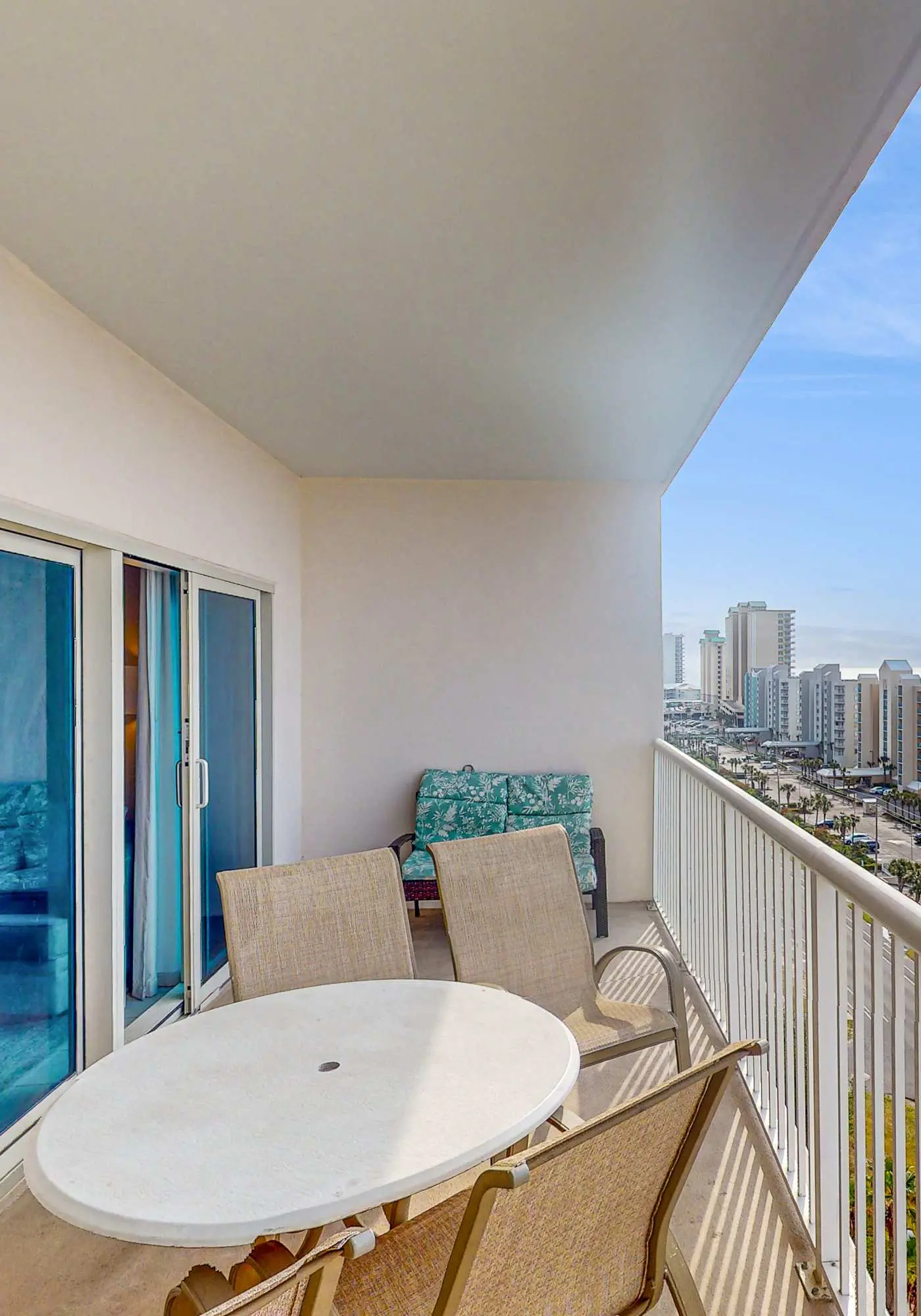 Gulf view condo with resort amenities, scenic balcony, open layout, W&D, & AC
