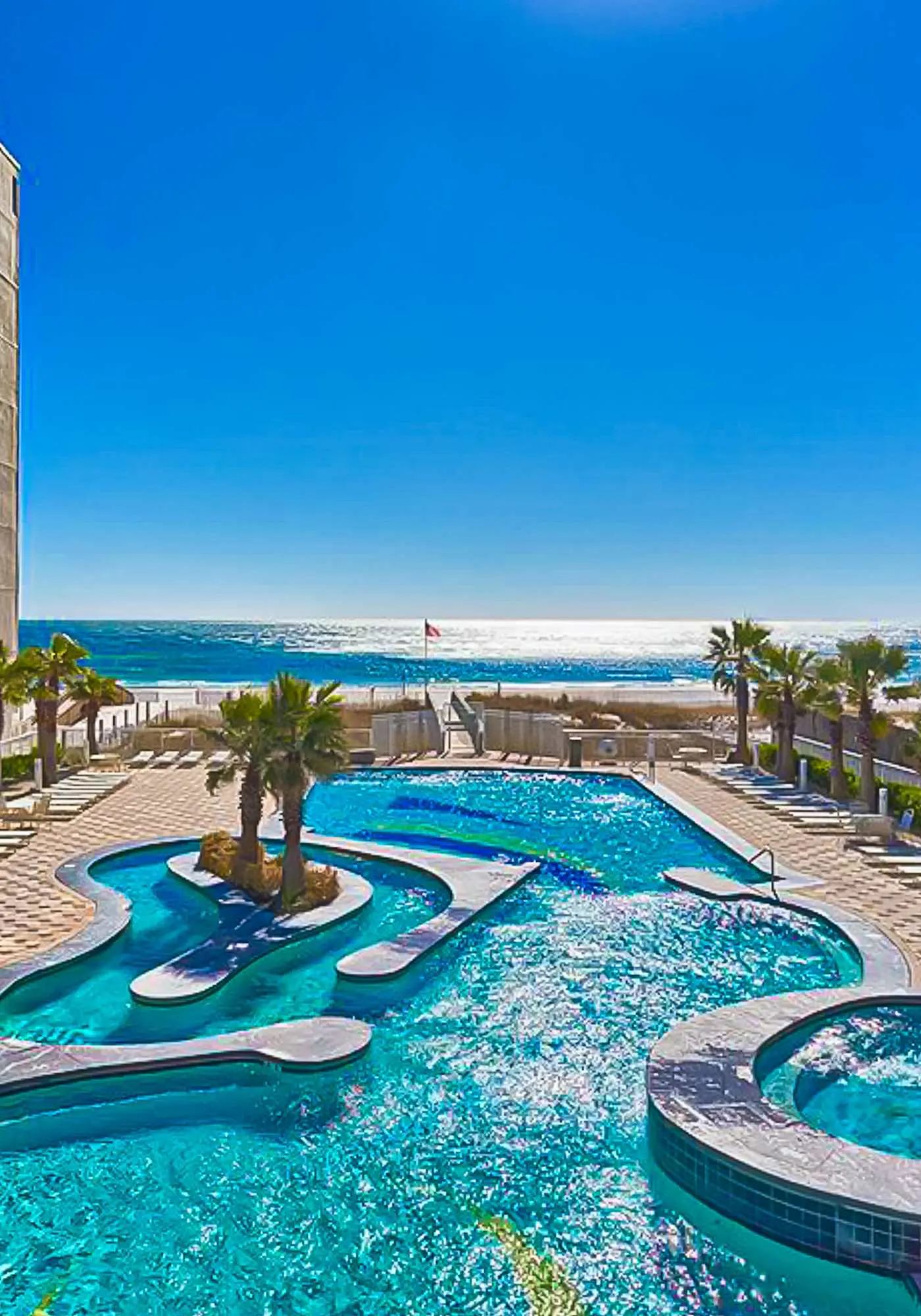 Gulf view condo on top floor with pools, hot tubs, saunas, gym & beach access