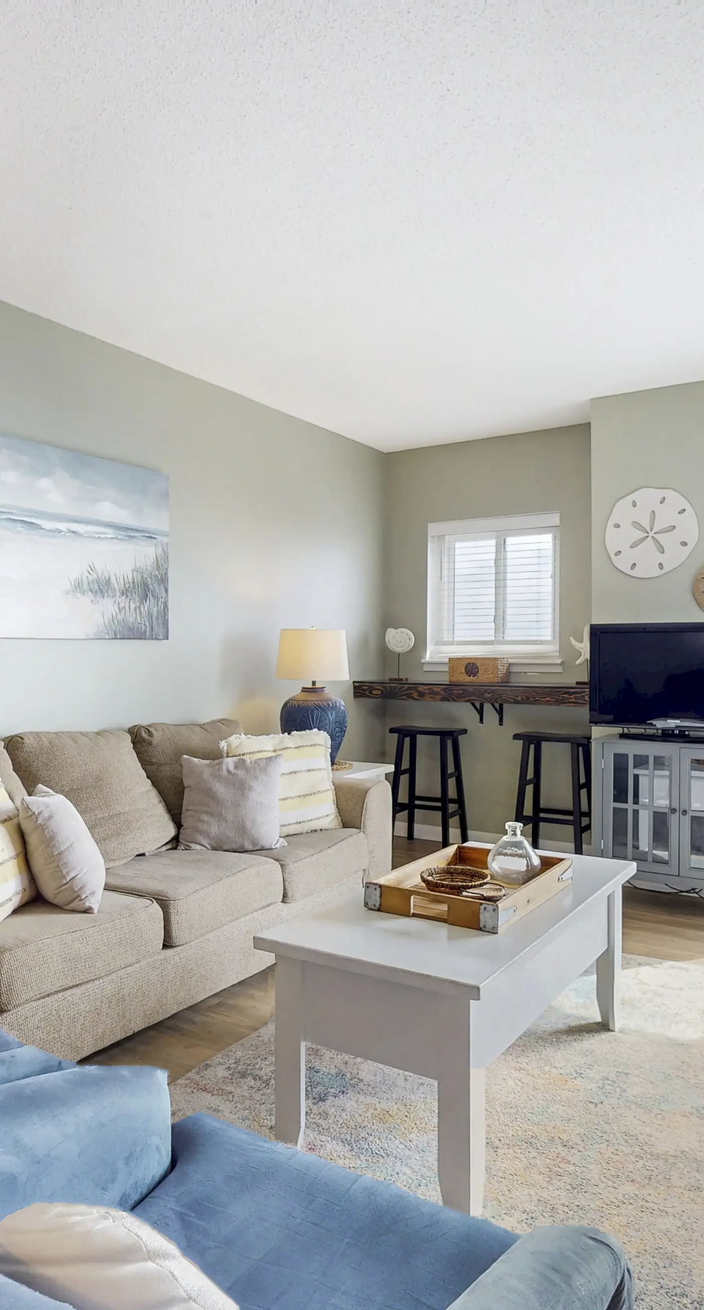 Bright coastal condo with Gulf views, pools, hot tub & private balcony