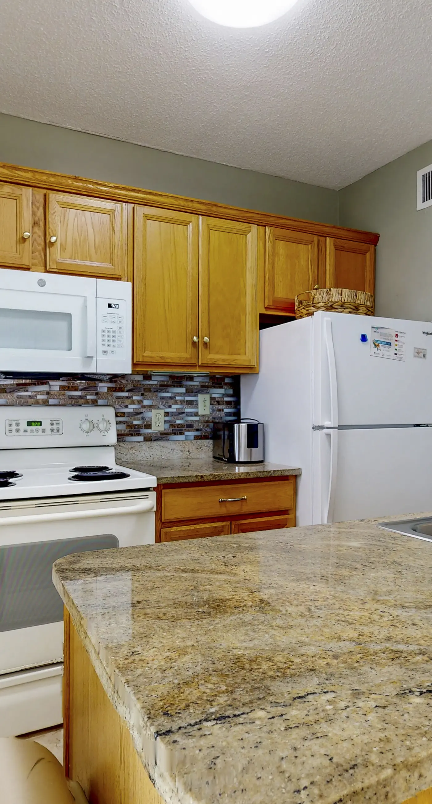 Bright coastal condo with Gulf views, pools, hot tub & private balcony