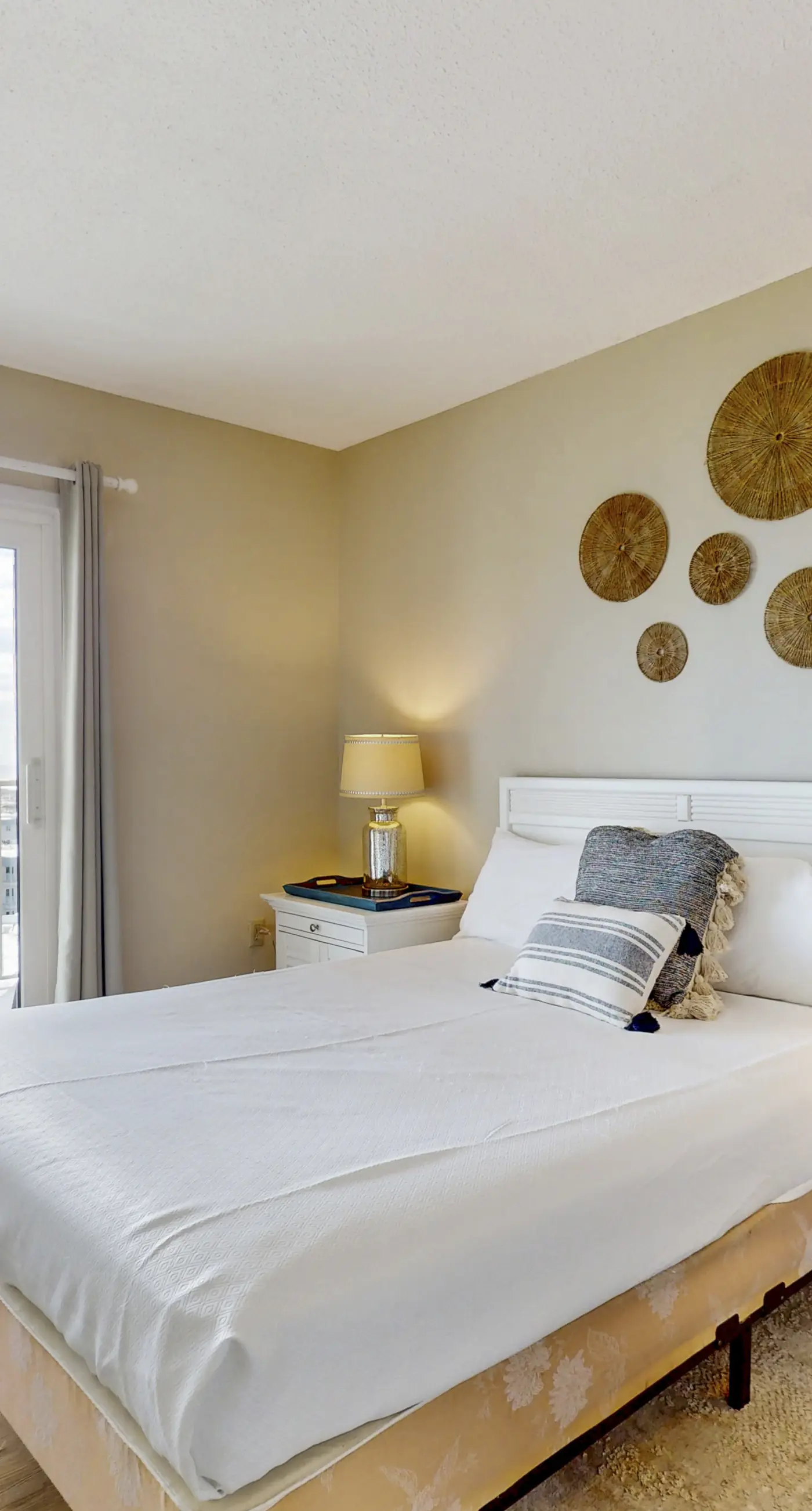Bright coastal condo with Gulf views, pools, hot tub & private balcony