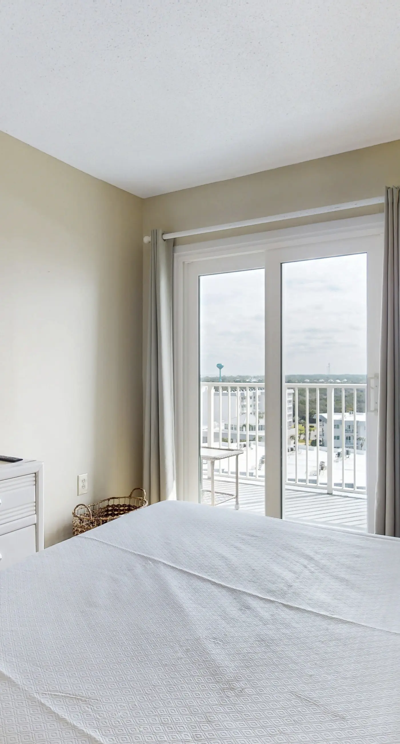 Bright coastal condo with Gulf views, pools, hot tub & private balcony