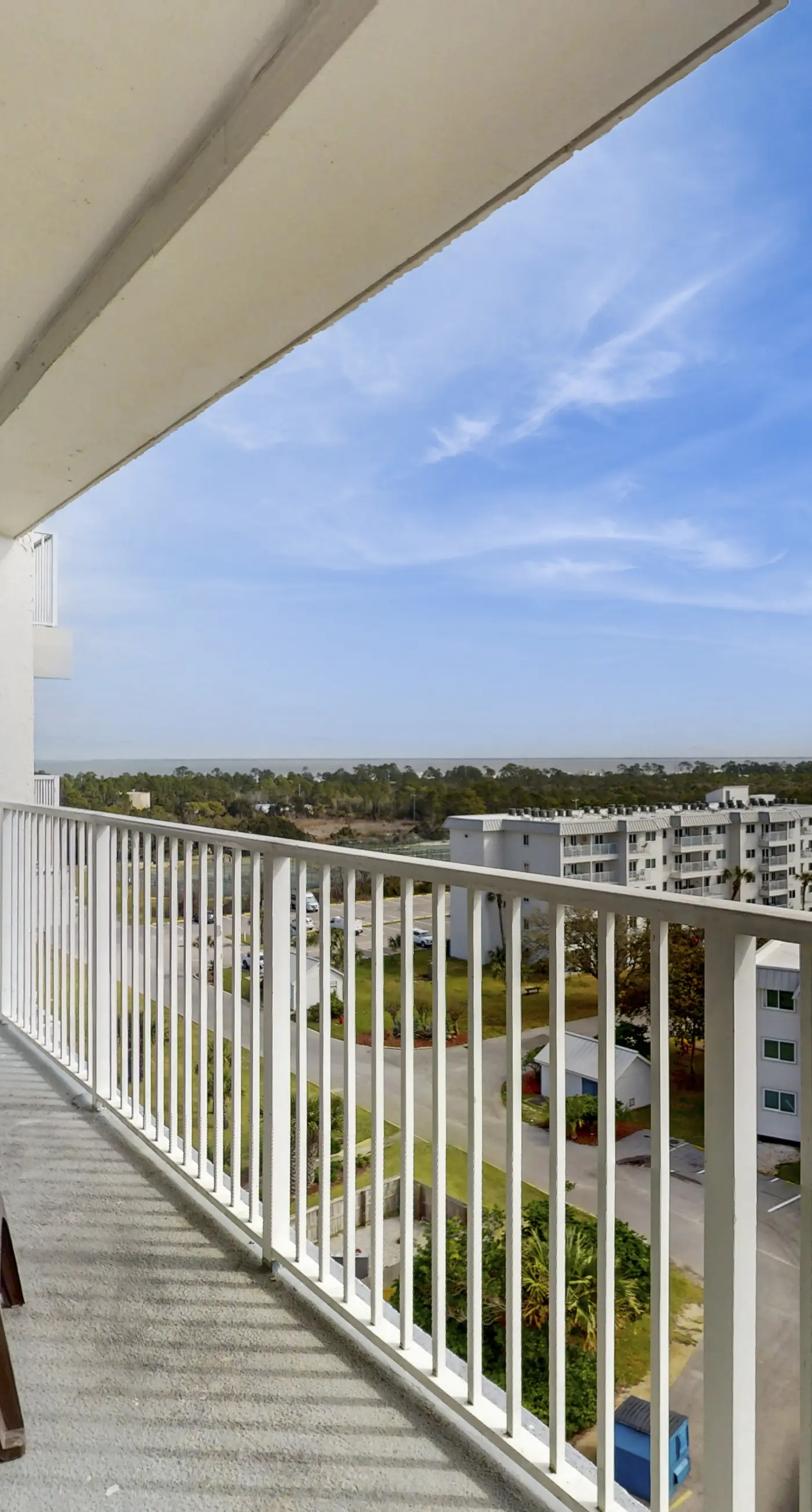 Bright coastal condo with Gulf views, pools, hot tub & private balcony