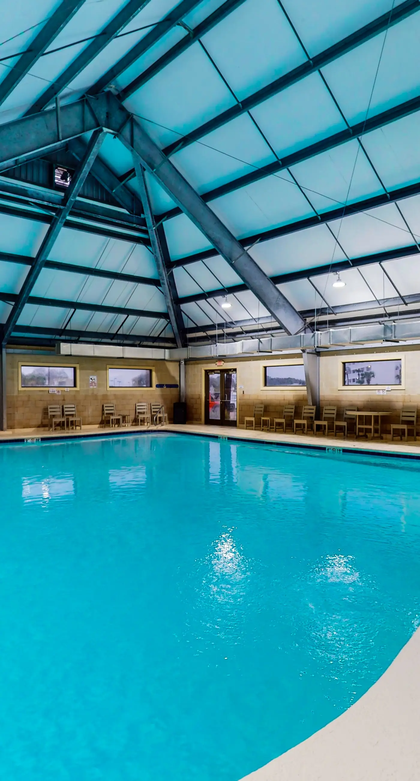 Bright coastal condo with Gulf views, pools, hot tub & private balcony
