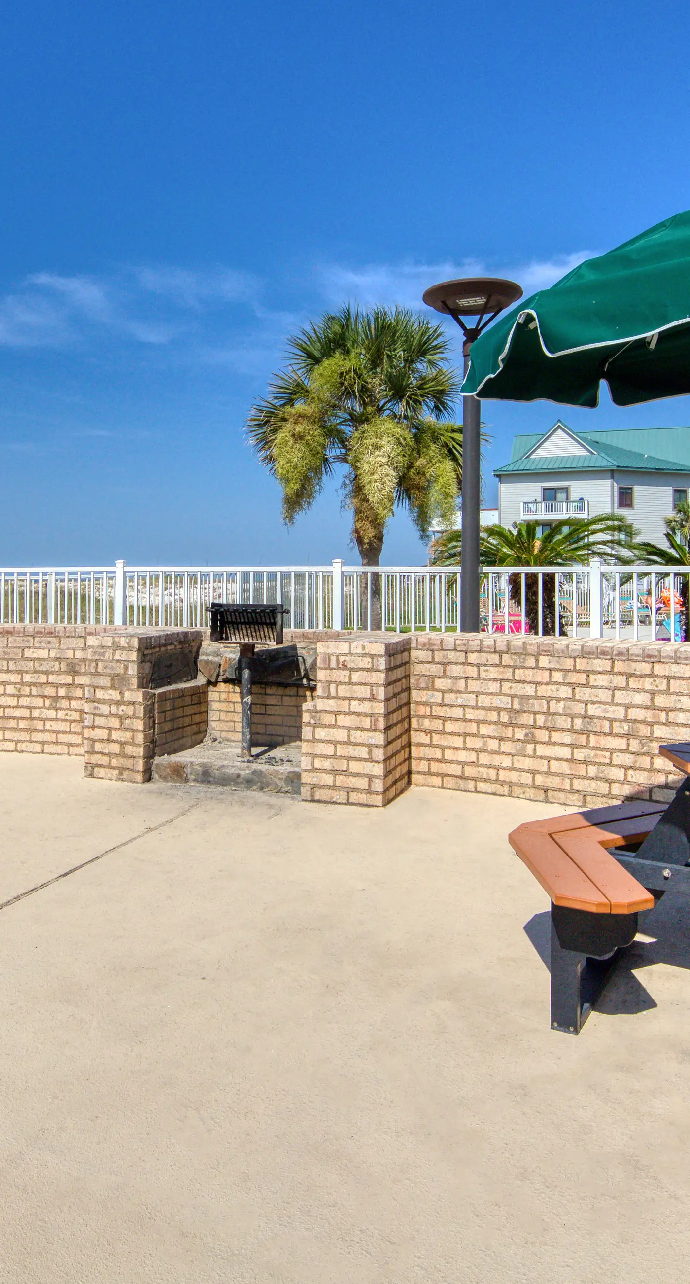 Bright coastal condo with Gulf views, pools, hot tub & private balcony