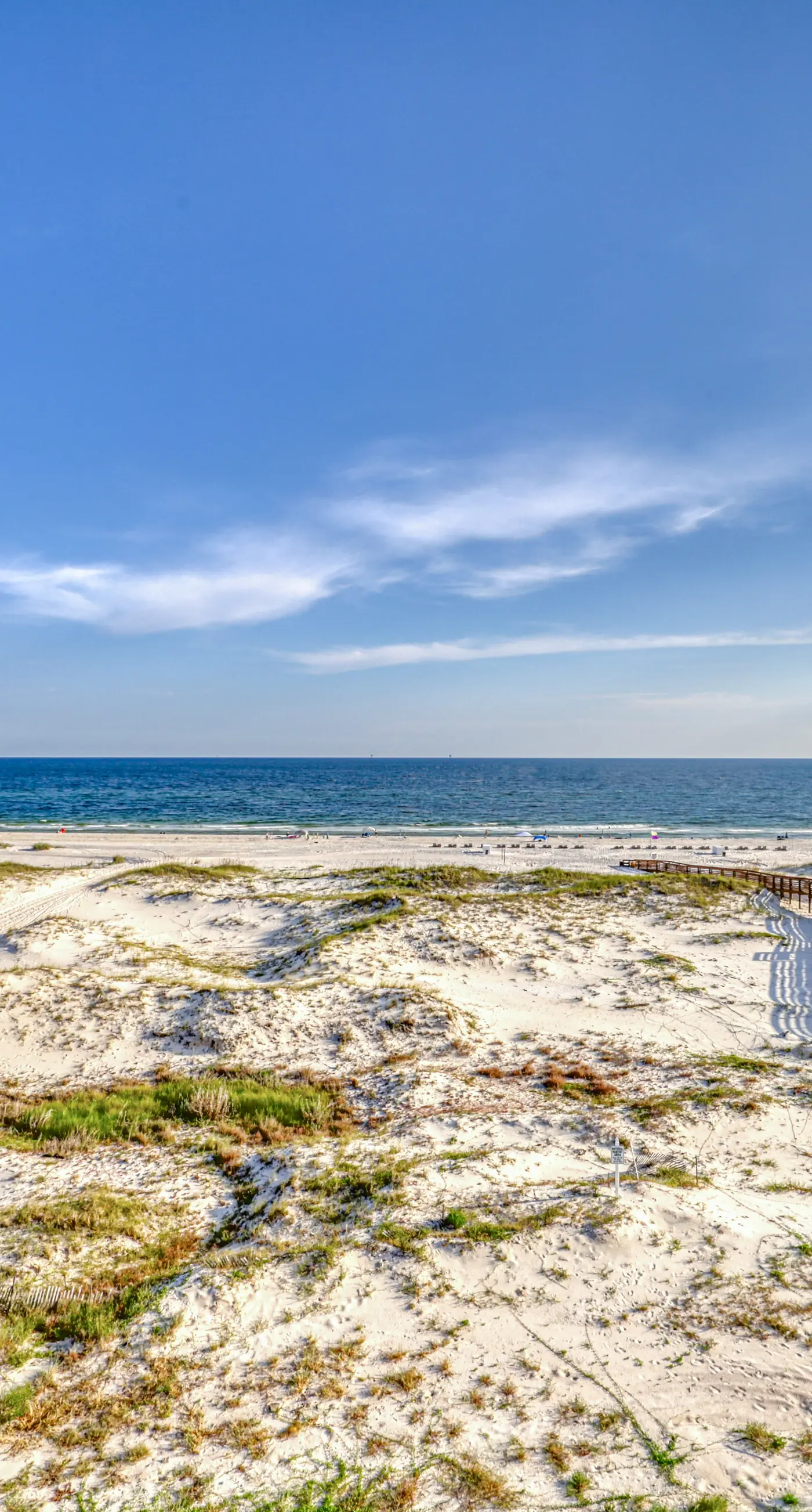 Bright coastal condo with Gulf views, pools, hot tub & private balcony