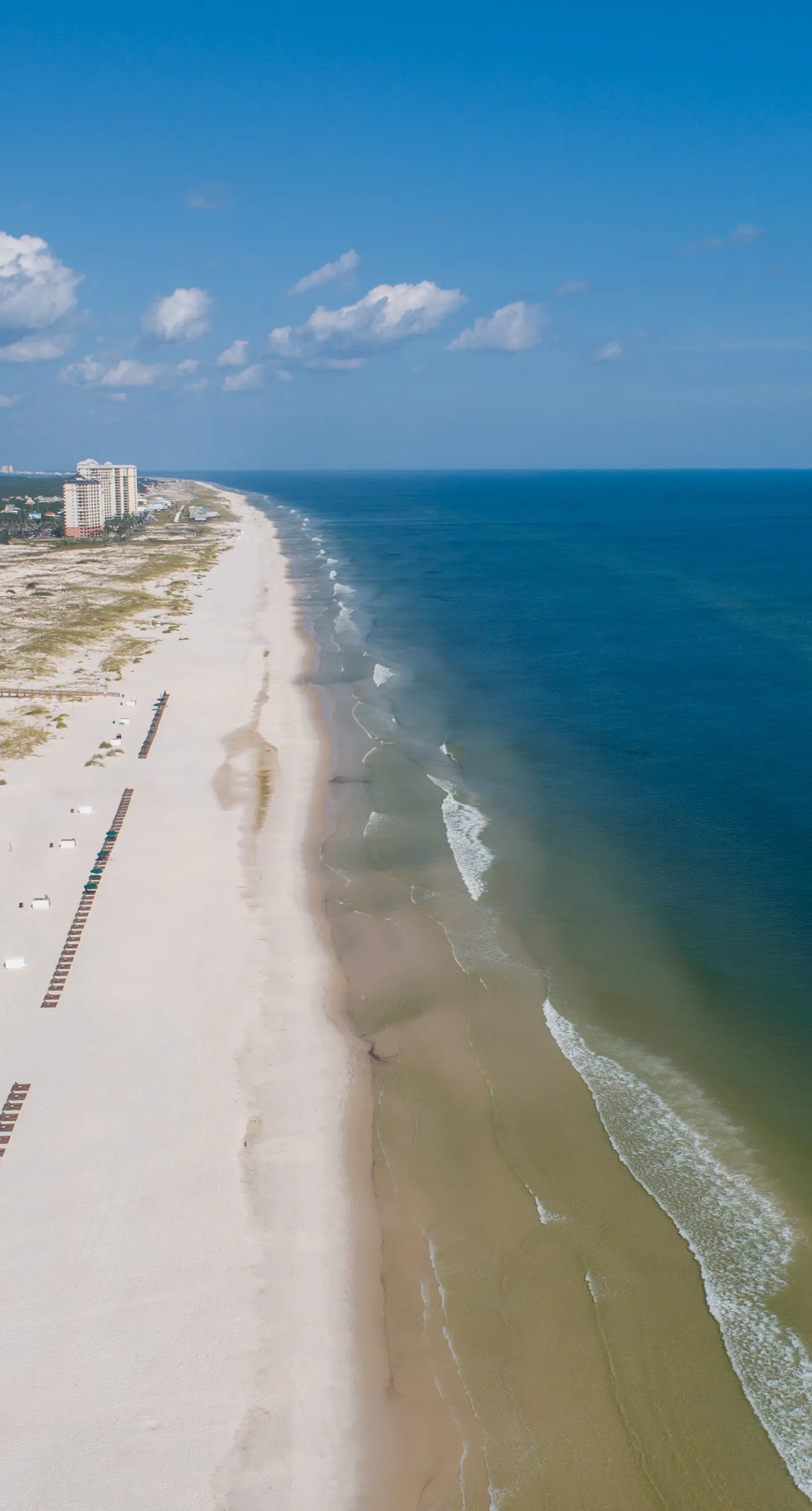 Bright coastal condo with Gulf views, pools, hot tub & private balcony