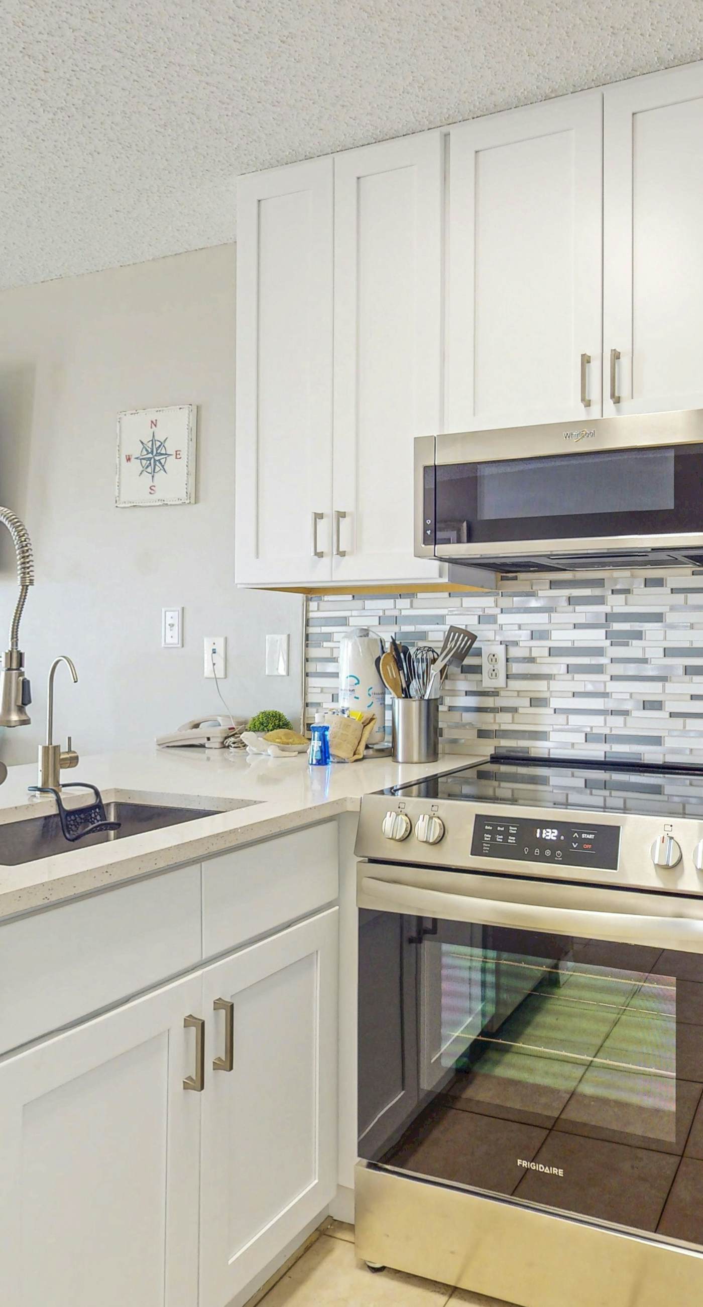 Beachfront condo with pool, private balcony, and washer and dryer