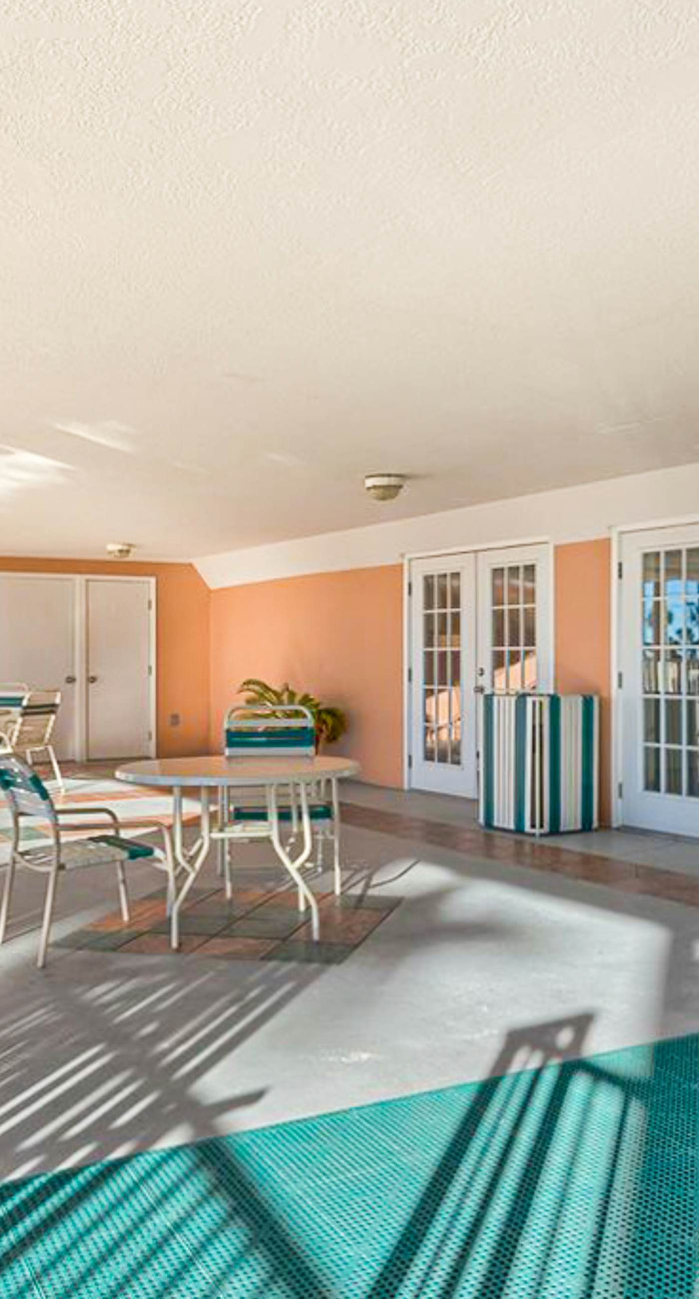 Beachfront condo with pool, private balcony, and washer and dryer