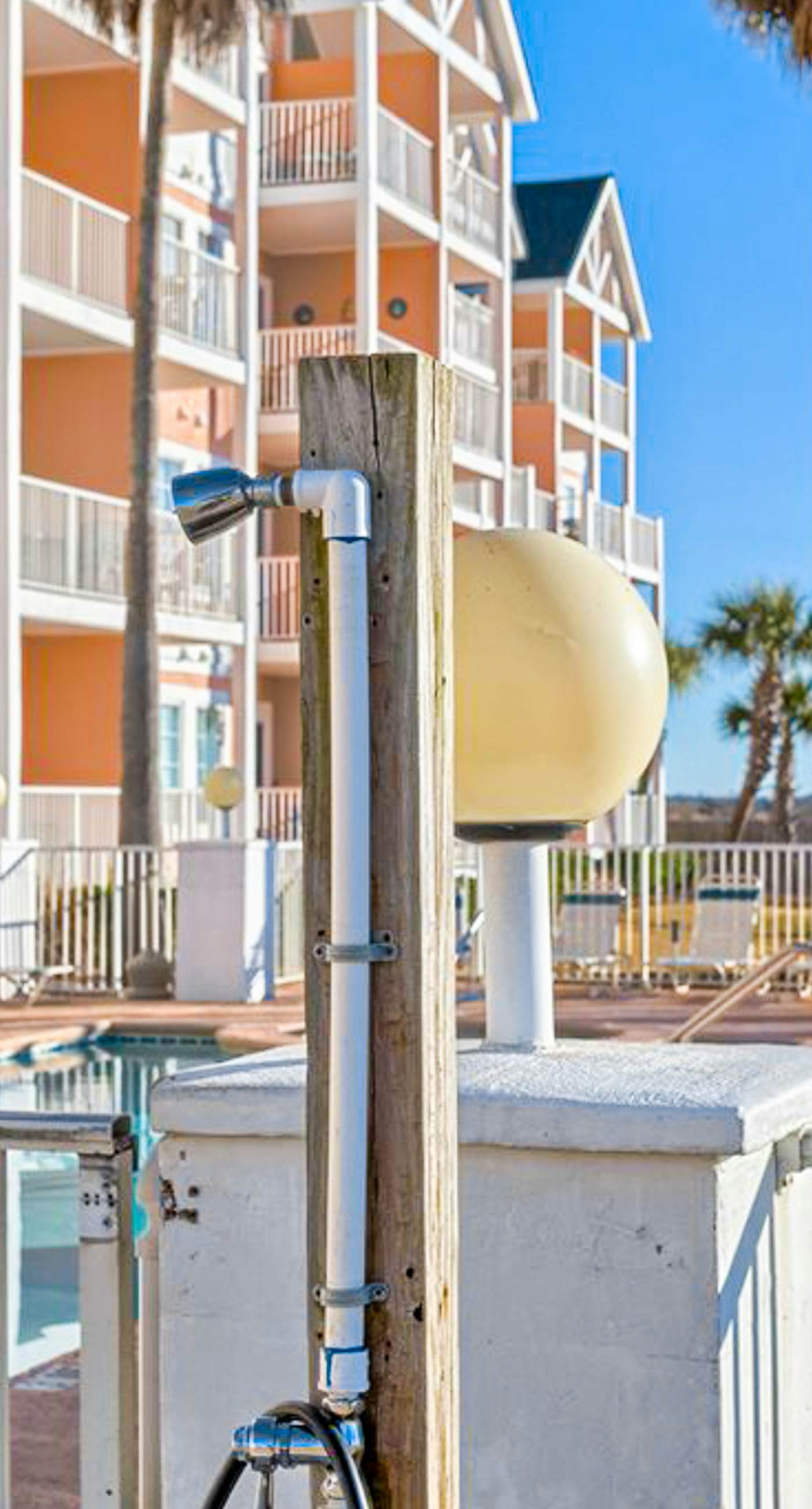 Beachfront condo with pool, private balcony, and washer and dryer