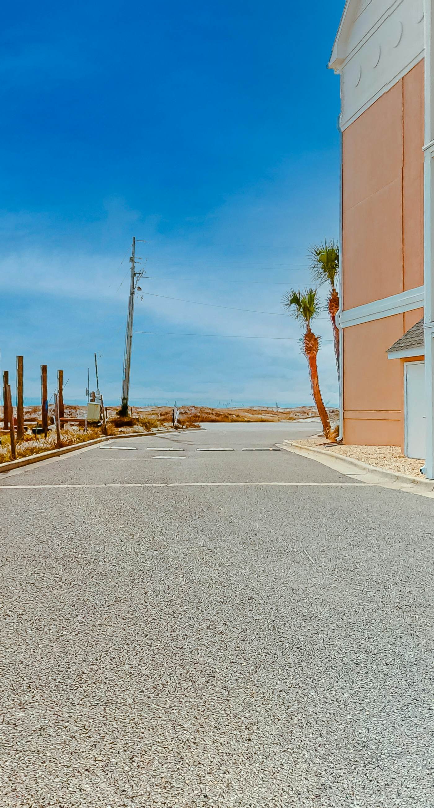 Beachfront condo with pool, private balcony, and washer and dryer