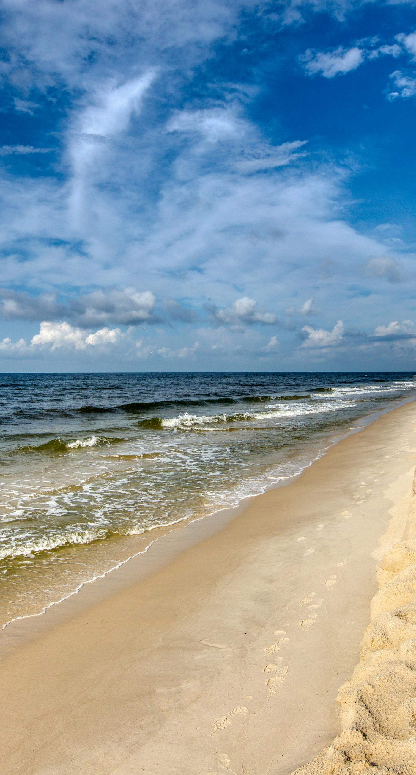 Sunny condo with boardwalk beach access, on-site pool, & private balcony